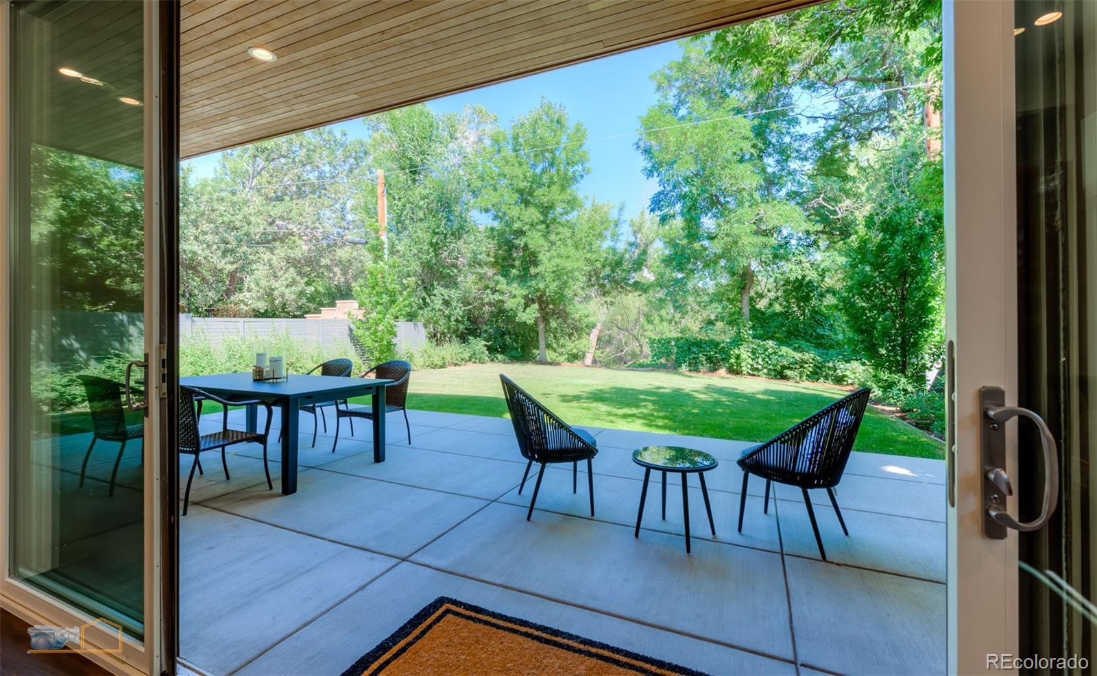 441 Arapahoe Avenue Boulder, CO 80302 - Photo 14 of 40 a view of a tables and chairs in patio