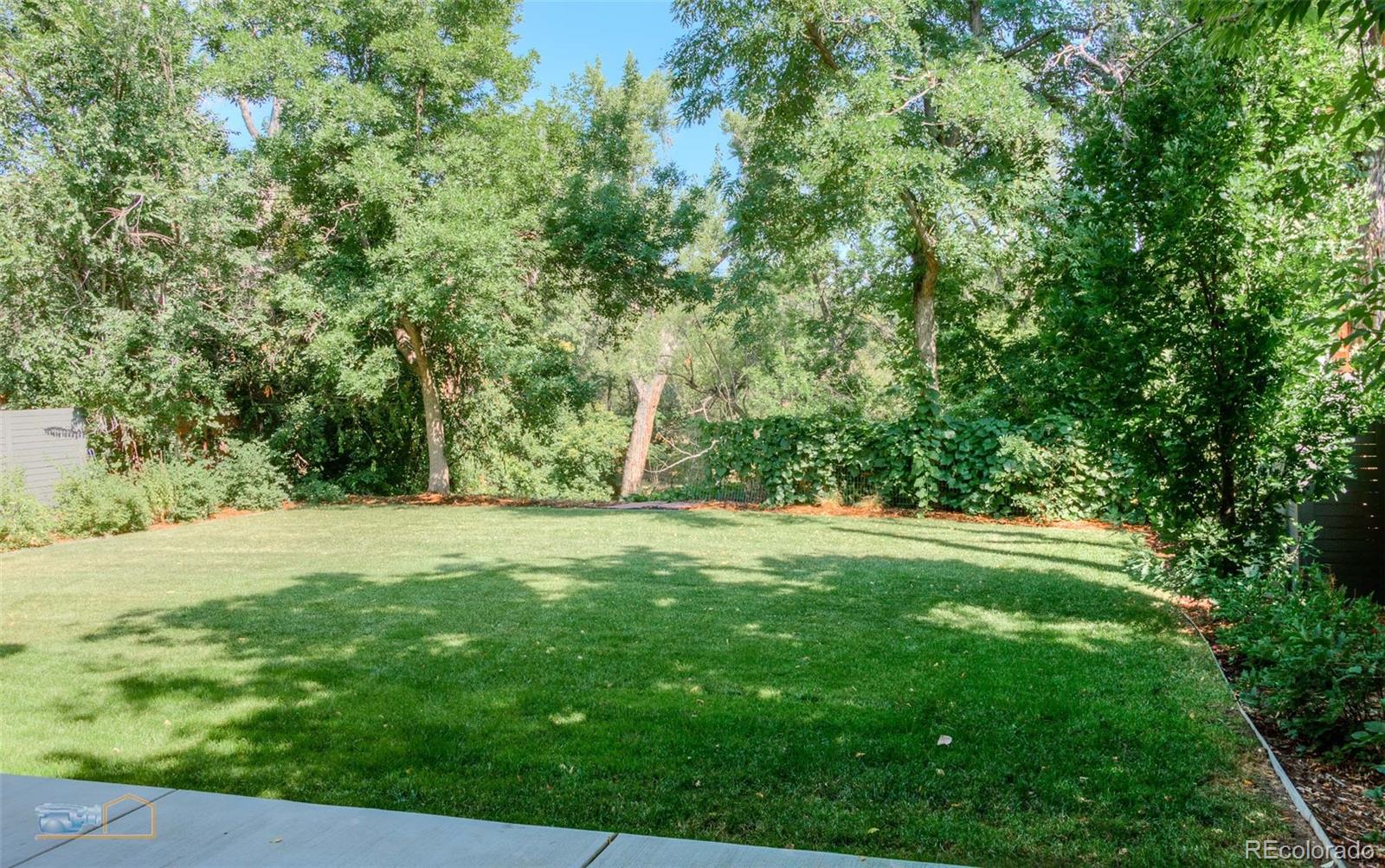 441 Arapahoe Avenue Boulder, CO 80302 - Photo 15 of 40 a view of outdoor space with deck and yard