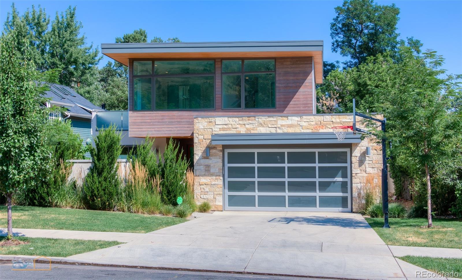 441 Arapahoe Avenue Boulder, CO 80302 - Photo 2 of 40 a front view of a house with a garden and yard