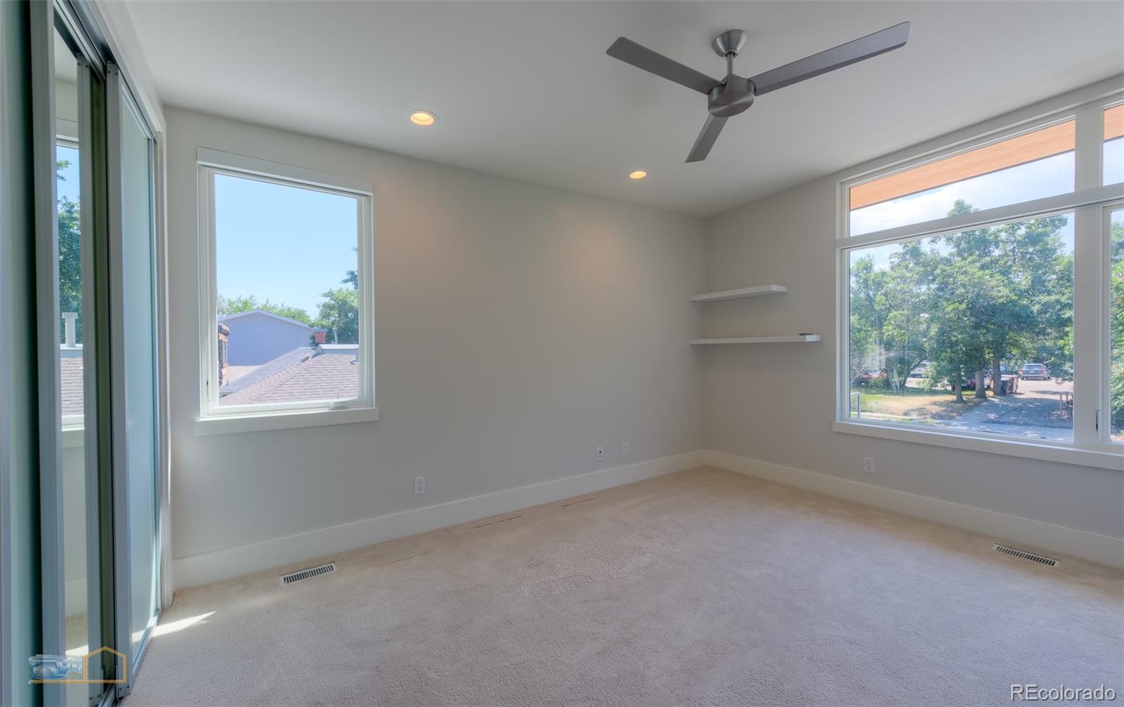 441 Arapahoe Avenue Boulder, CO 80302 - Photo 28 of 40 an empty room with a window
