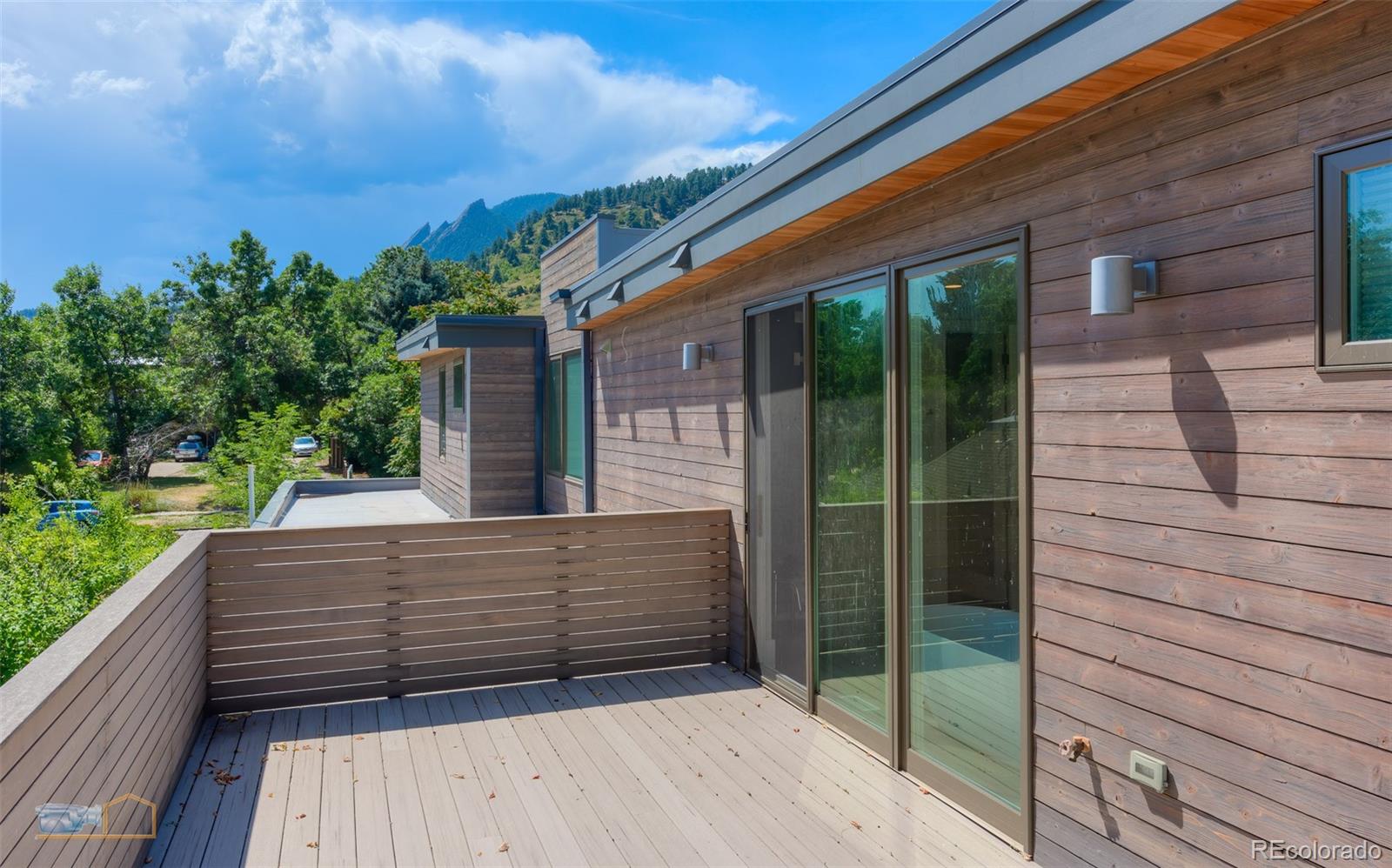 441 Arapahoe Avenue Boulder, CO 80302 - Photo 30 of 40 a view of house with a window and wooden floor