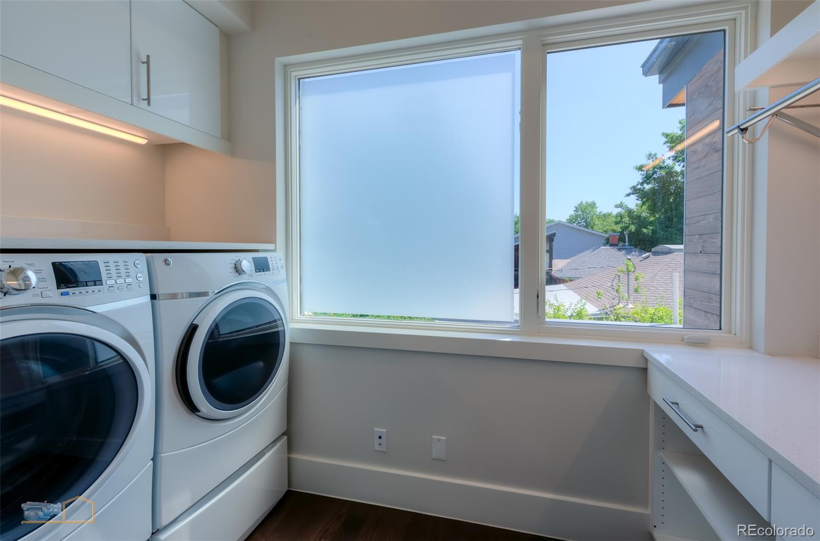 441 Arapahoe Avenue Boulder, CO 80302 - Photo 31 of 40 a utility room with dryer and washer