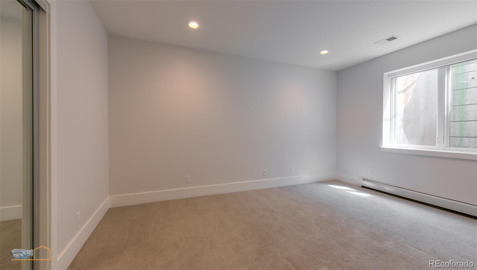 441 Arapahoe Avenue Boulder, CO 80302 - Photo 40 of 40 an empty room with a window