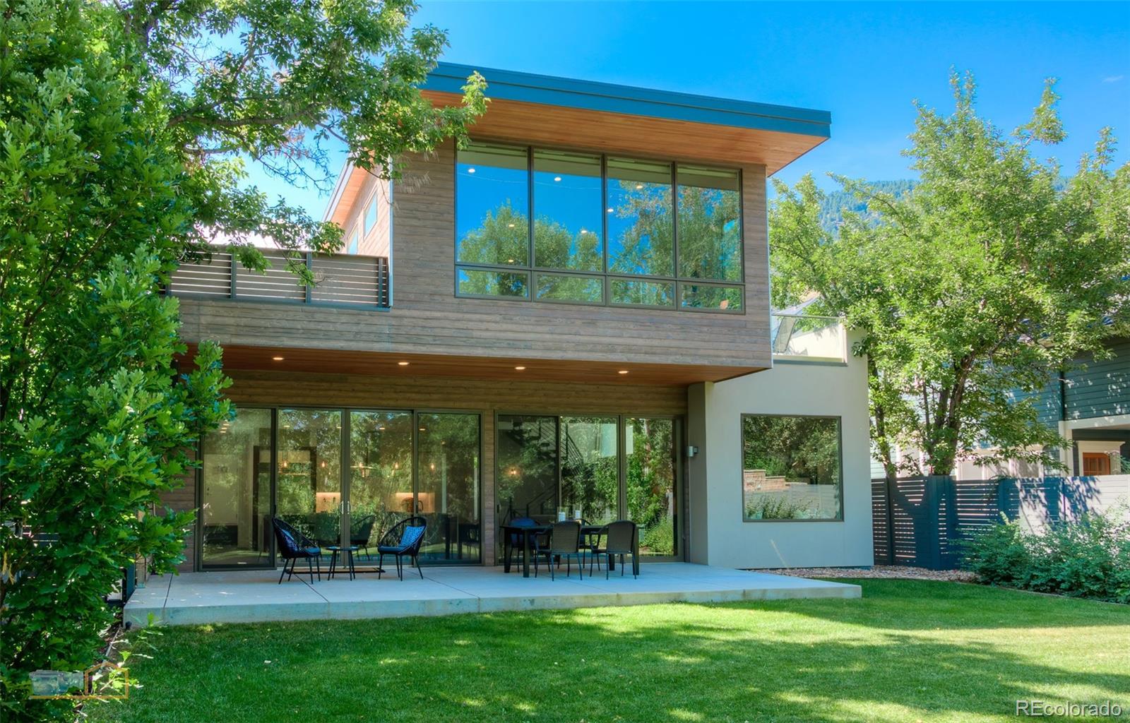 441 Arapahoe Avenue Boulder, CO 80302 - Photo 5 of 40 a view of a house with a yard and sitting area