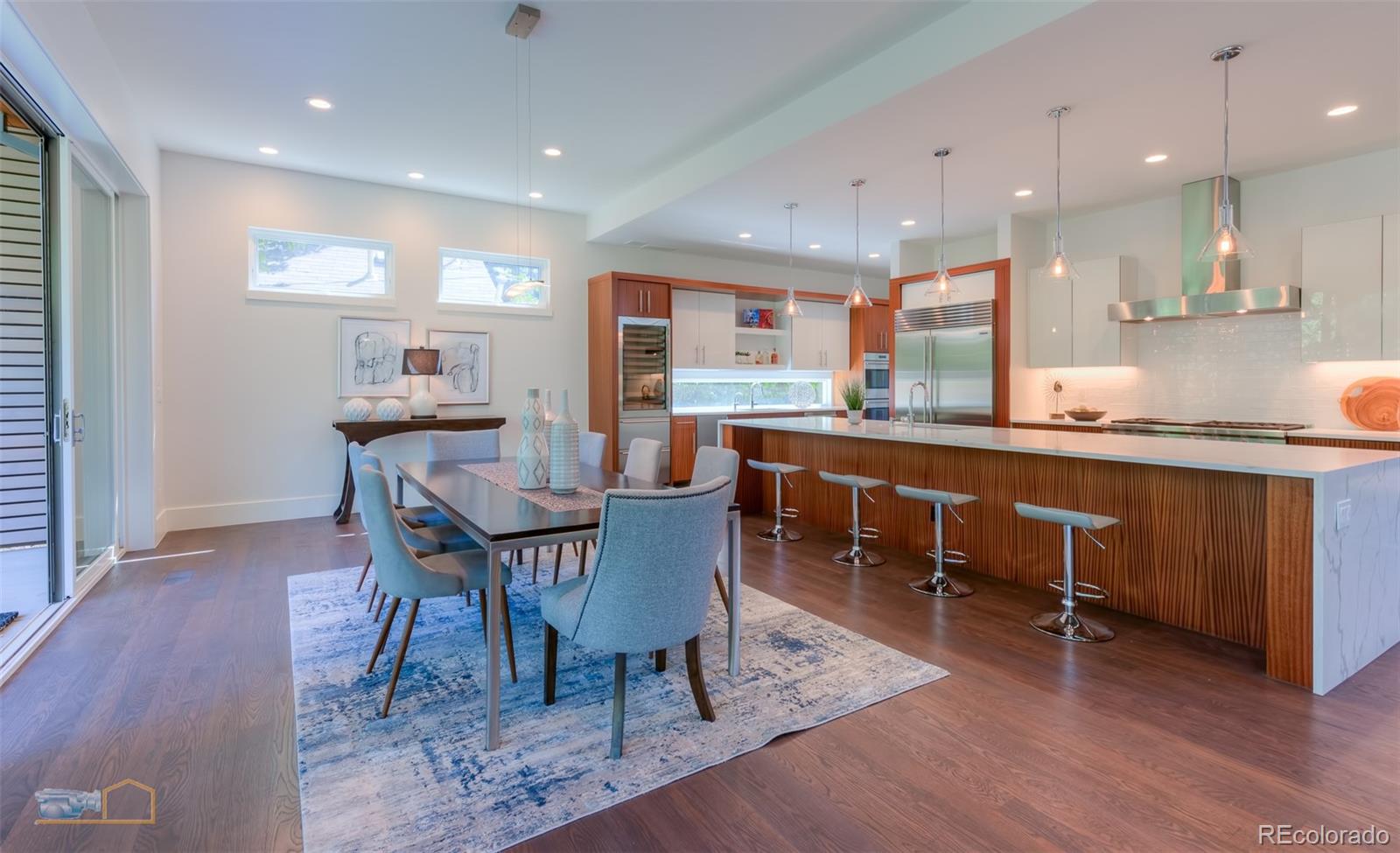 441 Arapahoe Avenue Boulder, CO 80302 - Photo 8 of 40 a dining hall with stainless steel appliances granite countertop a dining table and chairs