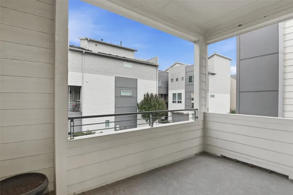 a bathroom with a bathtub and a window