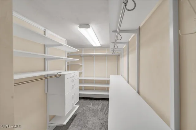 a view of an empty walk in closet