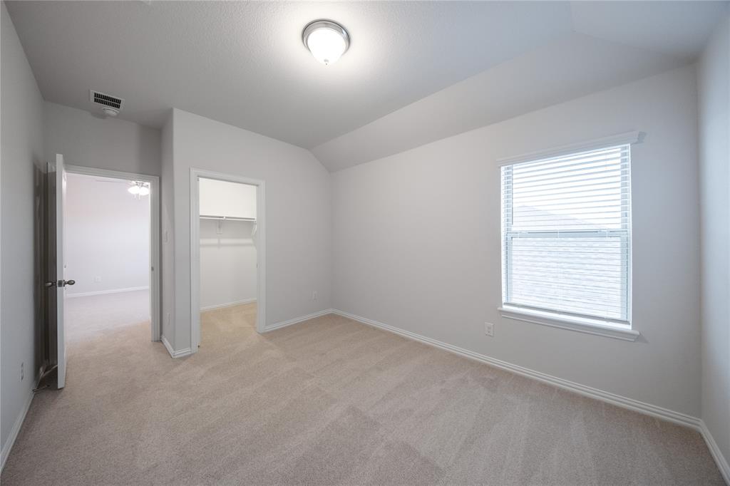 2606 Hawkins Street Anna, TX 75409 - Photo 3 of 31 an empty room with windows