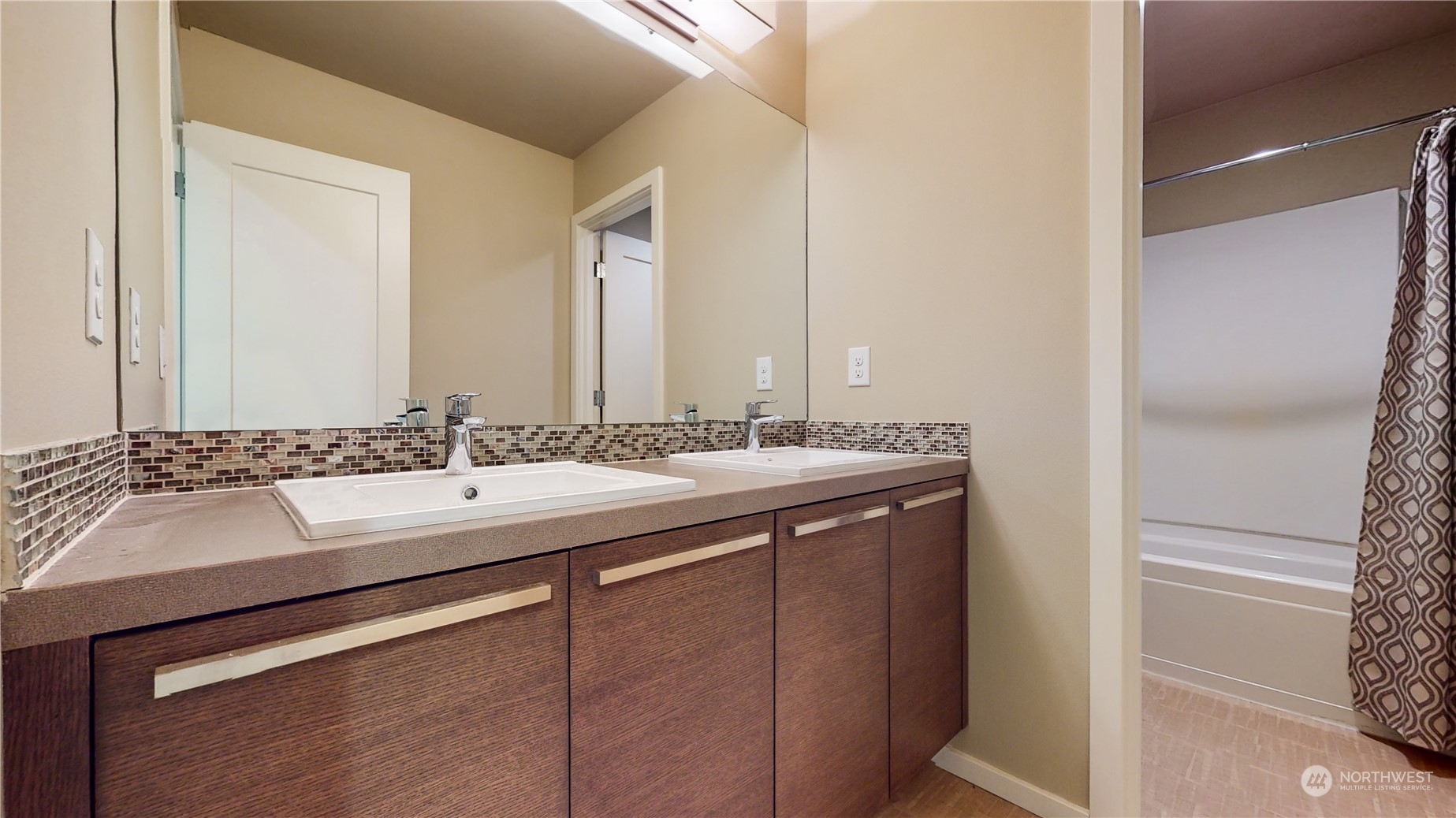 17009 42nd Drive Southeast Bothell, WA 98012 - Photo 18 of 26 a bathroom with a sink and a mirror