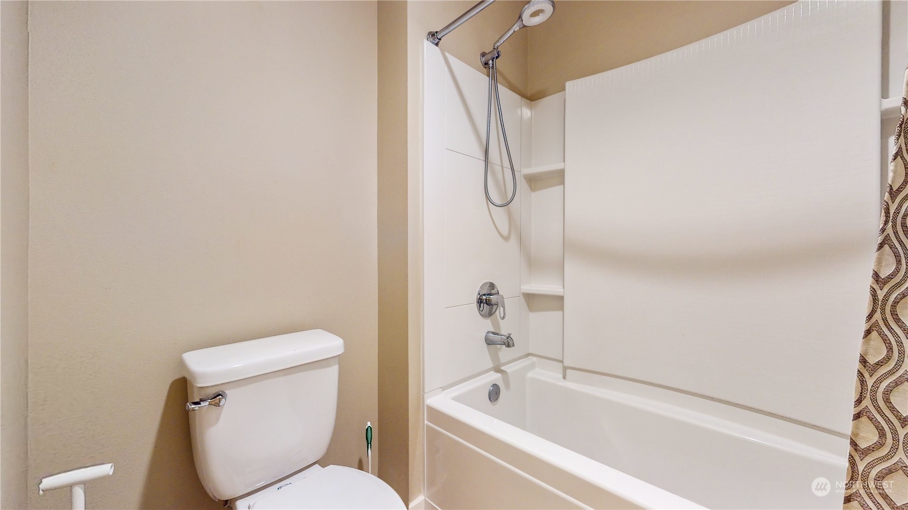 17009 42nd Drive Southeast Bothell, WA 98012 - Photo 19 of 26 a white toilet sitting next to a bath tub