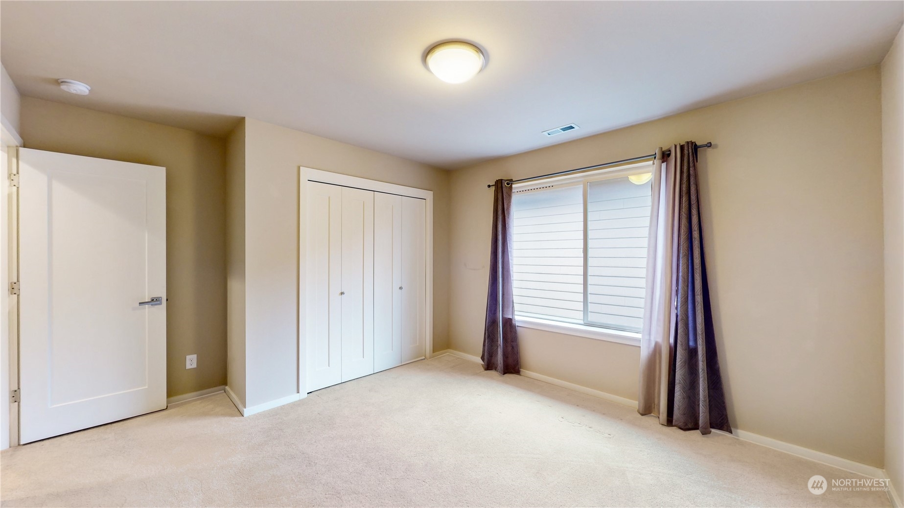 17009 42nd Drive Southeast Bothell, WA 98012 - Photo 21 of 26 an empty room with windows