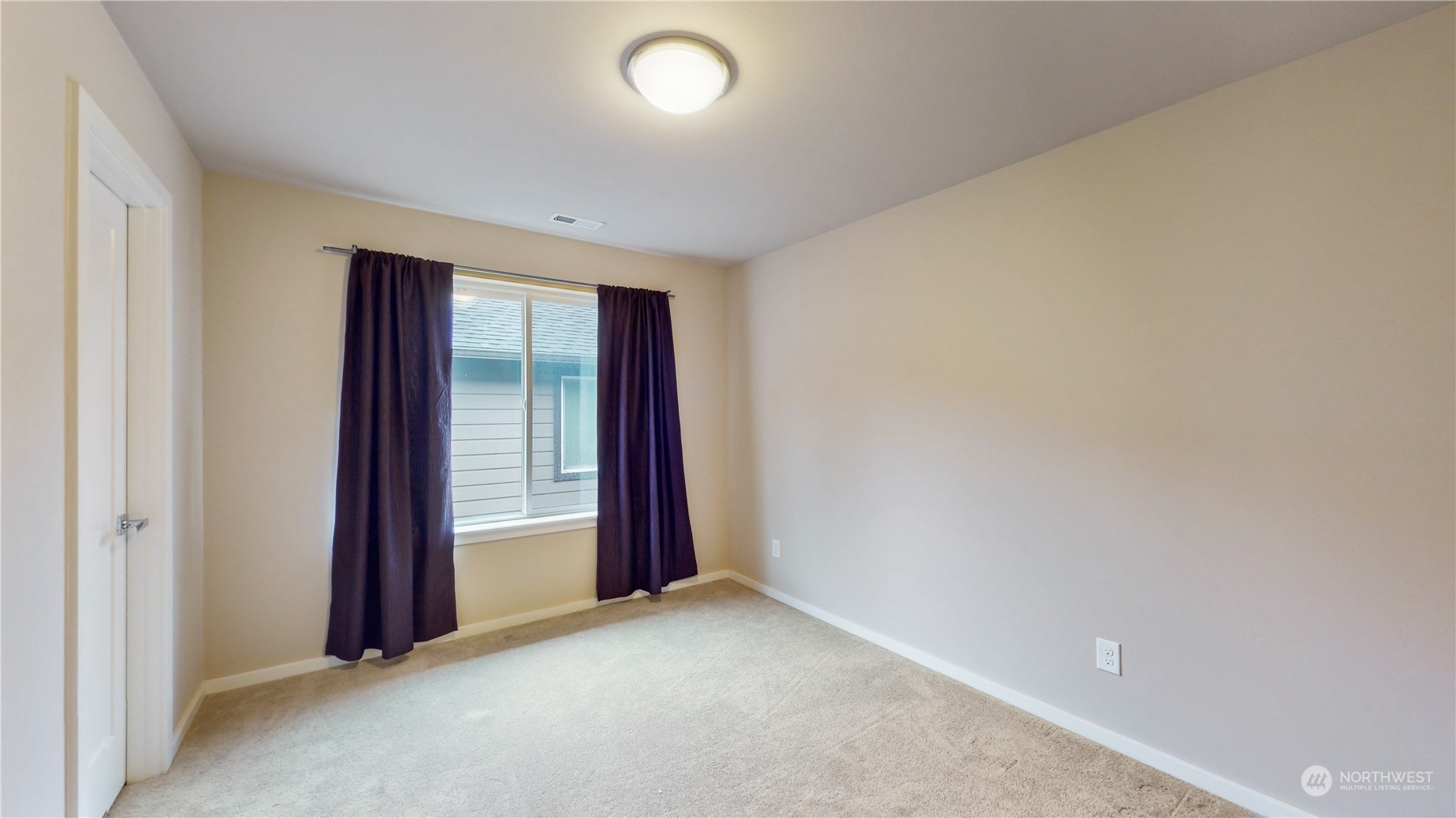 17009 42nd Drive Southeast Bothell, WA 98012 - Photo 22 of 26 an empty room with windows