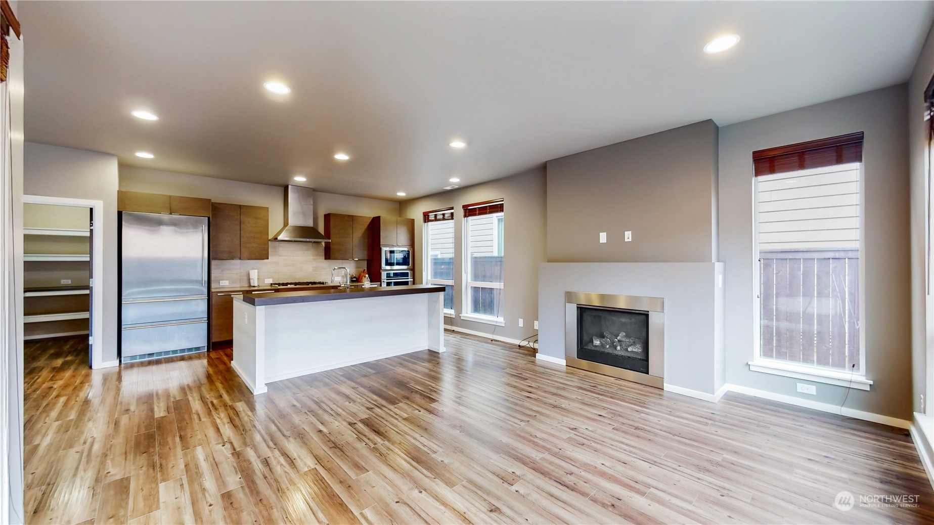 17009 42nd Drive Southeast Bothell, WA 98012 - Photo 4 of 26 a view of kitchen with sink and refrigerator