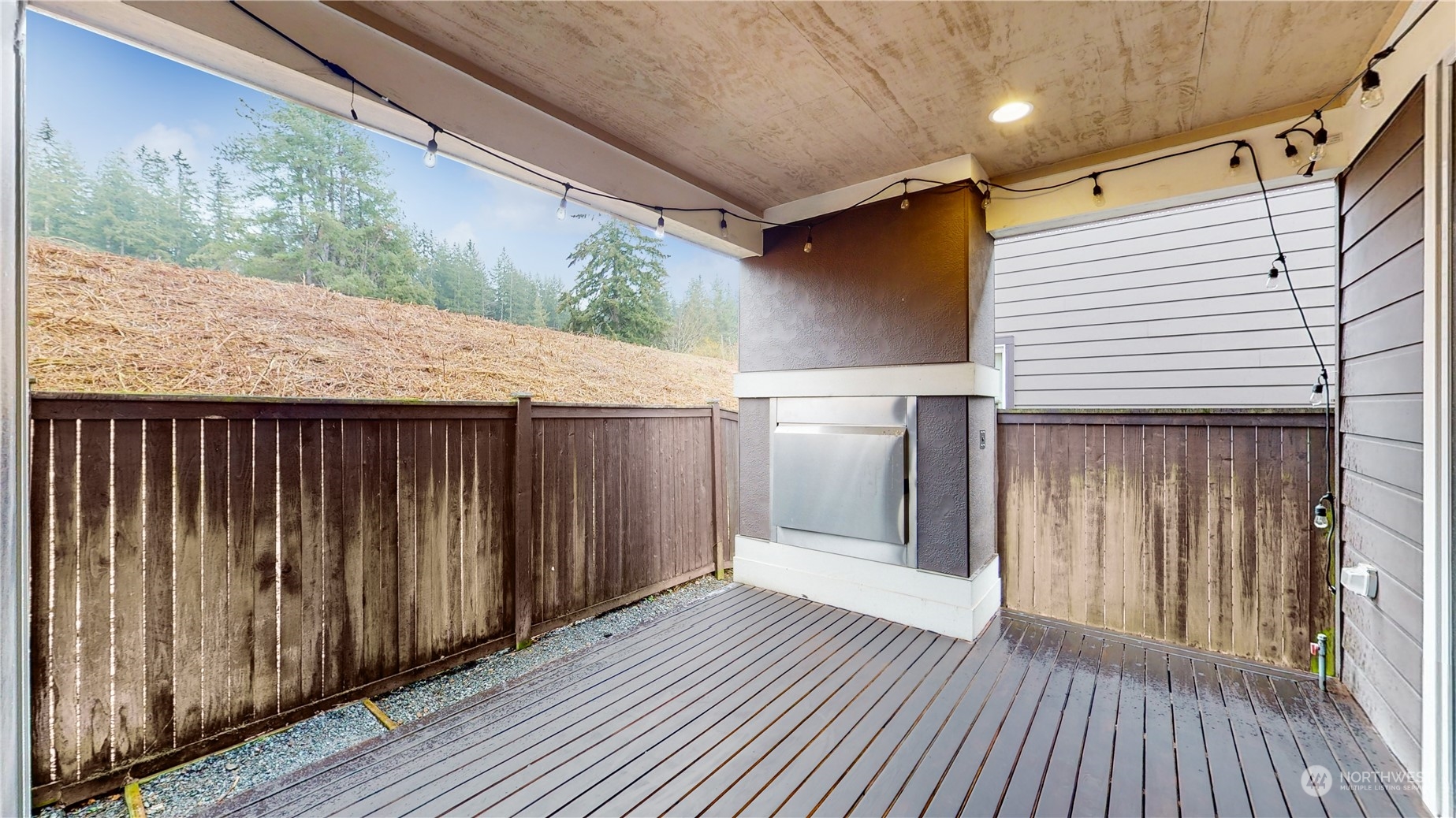 17009 42nd Drive Southeast Bothell, WA 98012 - Photo 9 of 26 a view of a backyard with wooden floor