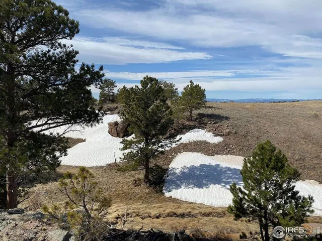 a view of outdoor space with mountain view