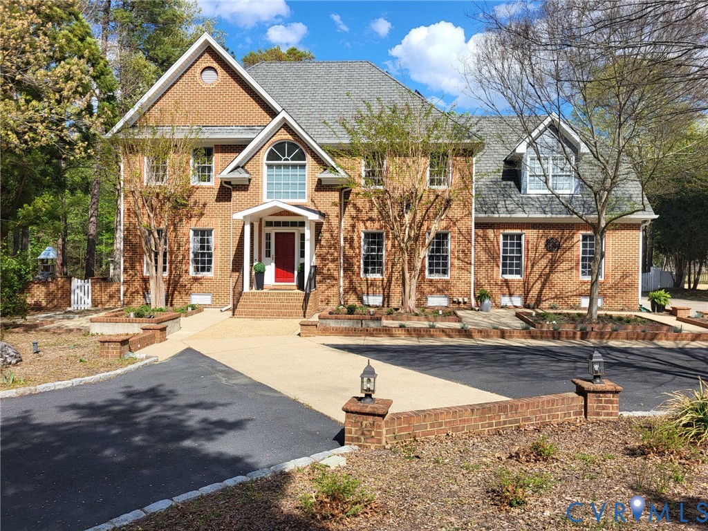 2611 Robys Way Midlothian, VA 23113 - Photo 1 of 1 a front view of a building with street view