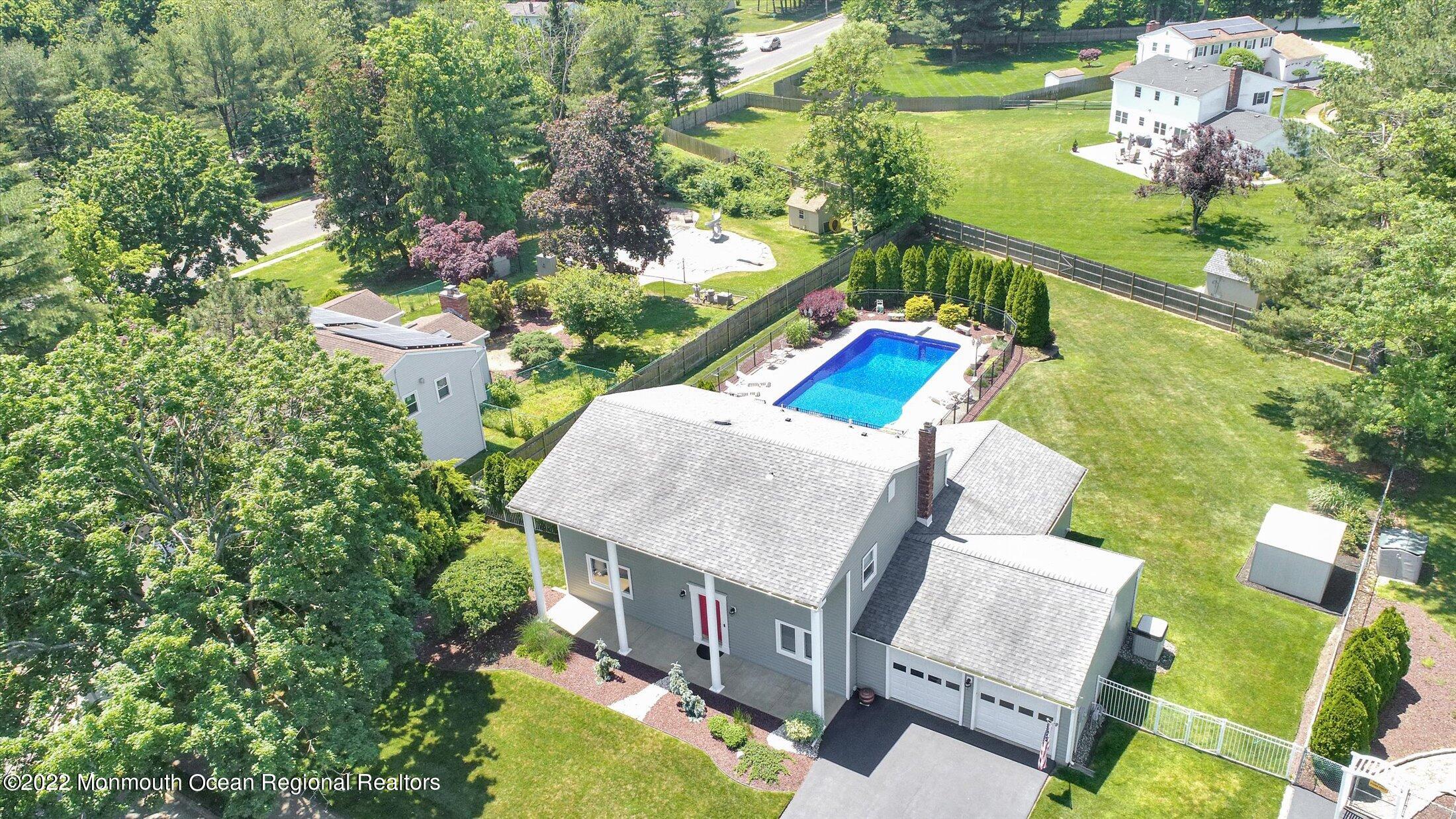 4 Sussex Road Morganville, NJ 07751 - Photo 54 of 55 a view of yard from terrace with seating space