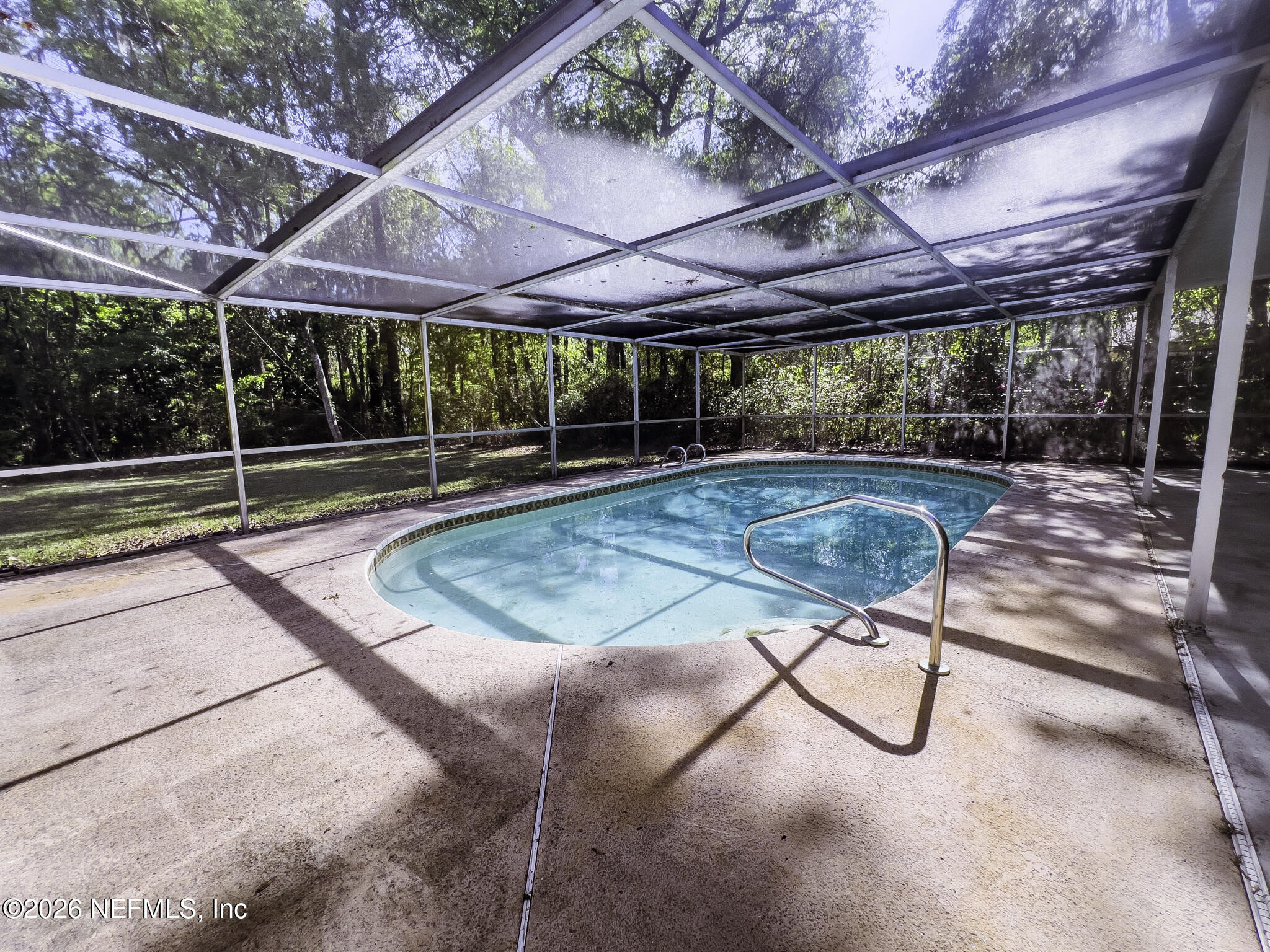 2085 Mills Road Jacksonville, FL 32216 - Photo 10 of 13 a view of a backyard with a patio