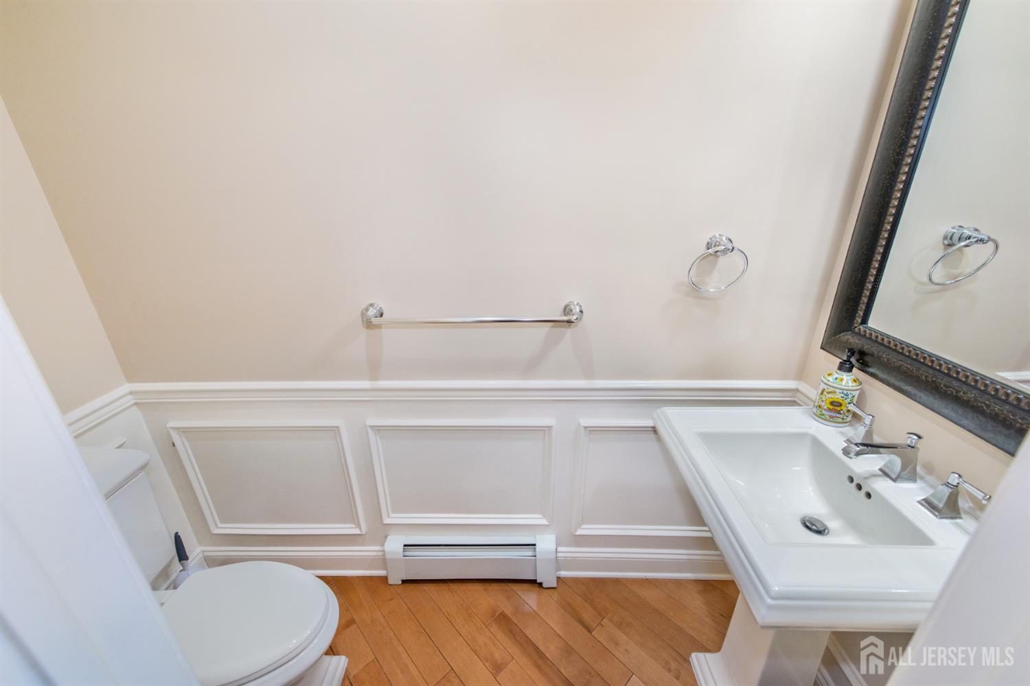 76 Raritan Reach Road South Amboy, NJ 08879 - Photo 12 of 48 a bathroom with a sink and toilet