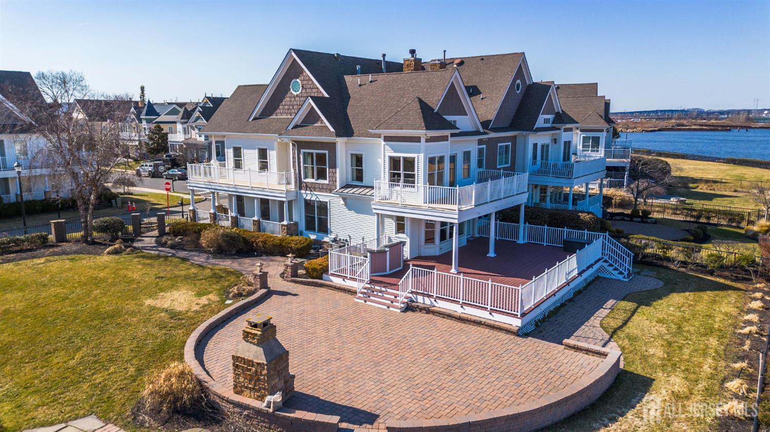 76 Raritan Reach Road South Amboy, NJ 08879 - Photo 4 of 48 a view of a swimming pool with a patio