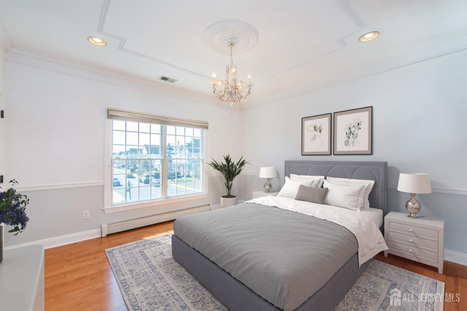 76 Raritan Reach Road South Amboy, NJ 08879 - Photo 42 of 48 a bedroom with a large bed and a window