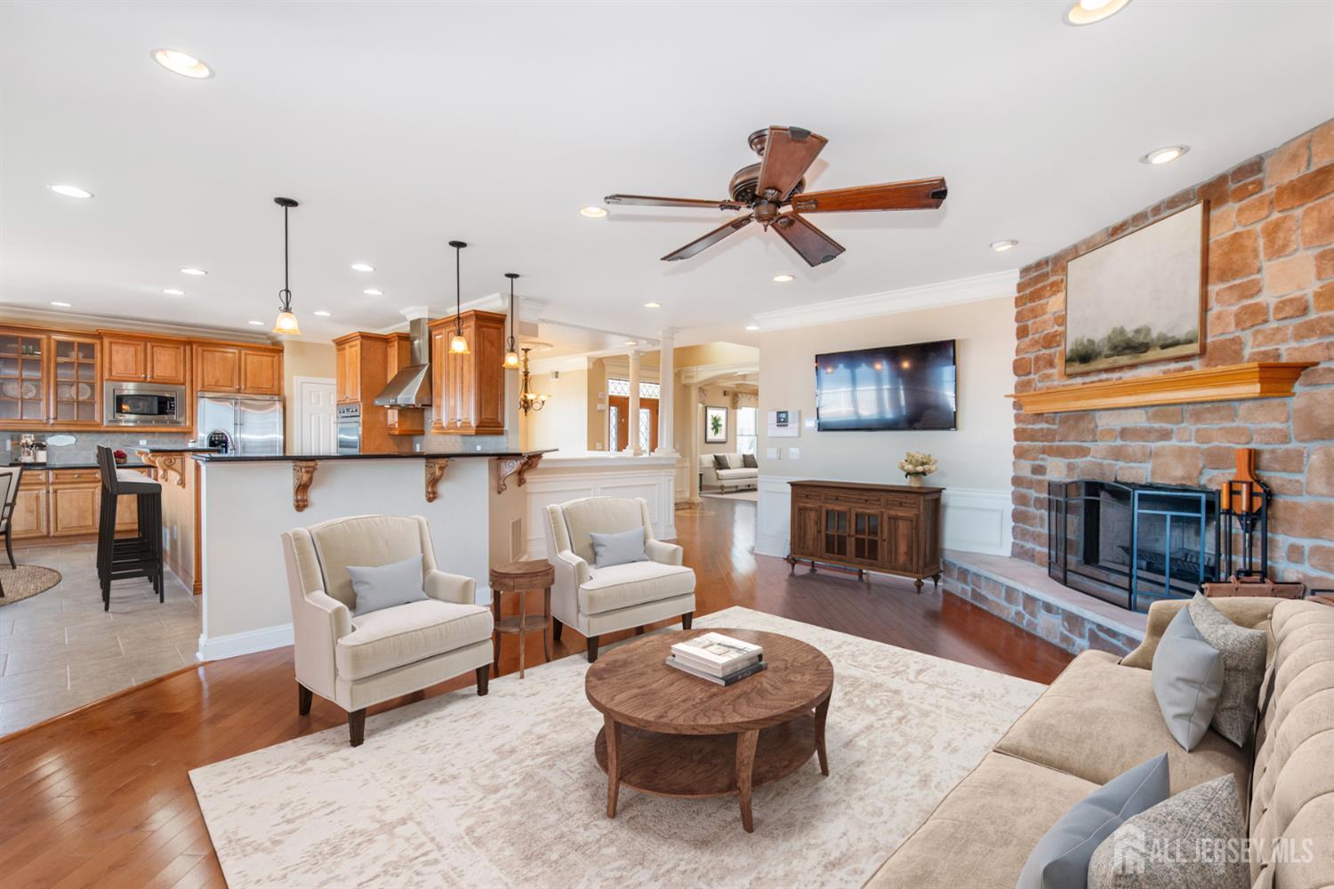 76 Raritan Reach Road South Amboy, NJ 08879 - Photo 47 of 48 a living room with furniture and a fireplace