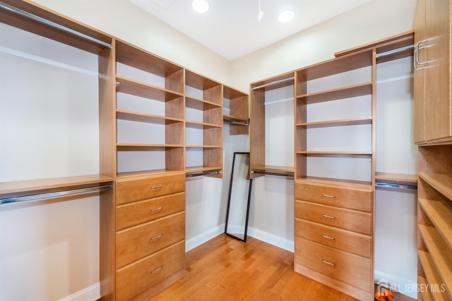 76 Raritan Reach Road South Amboy, NJ 08879 - Photo 7 of 48 a view of walk in closet with empty racks