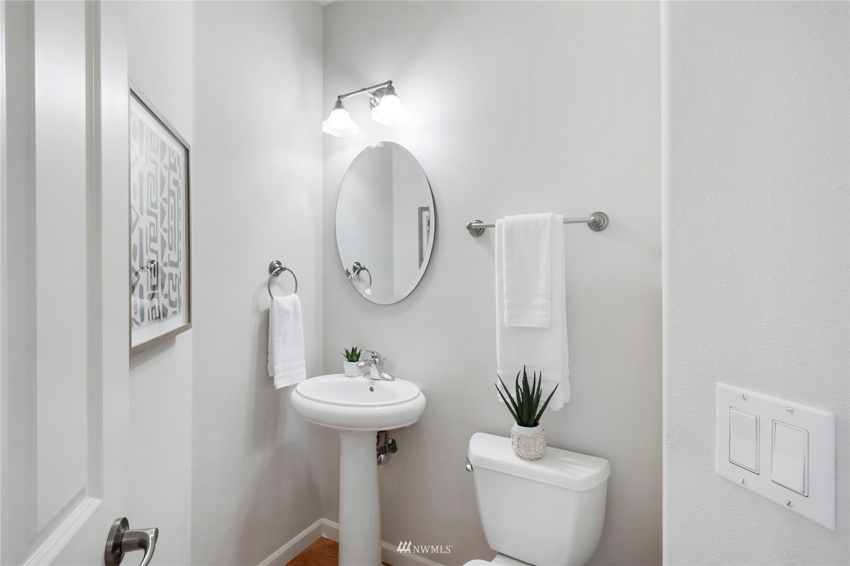 3904 Park Avenue North Renton, WA 98056 - Photo 18 of 40 a bathroom with a sink toilet and a mirror