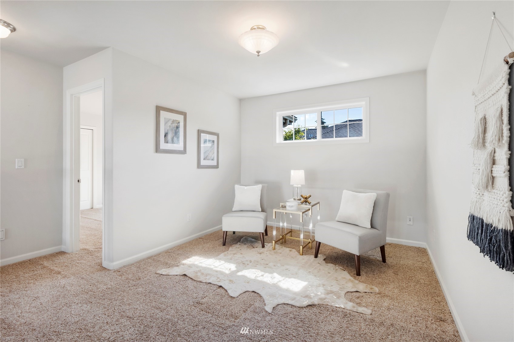 3904 Park Avenue North Renton, WA 98056 - Photo 24 of 40 a living room with furniture and a rug