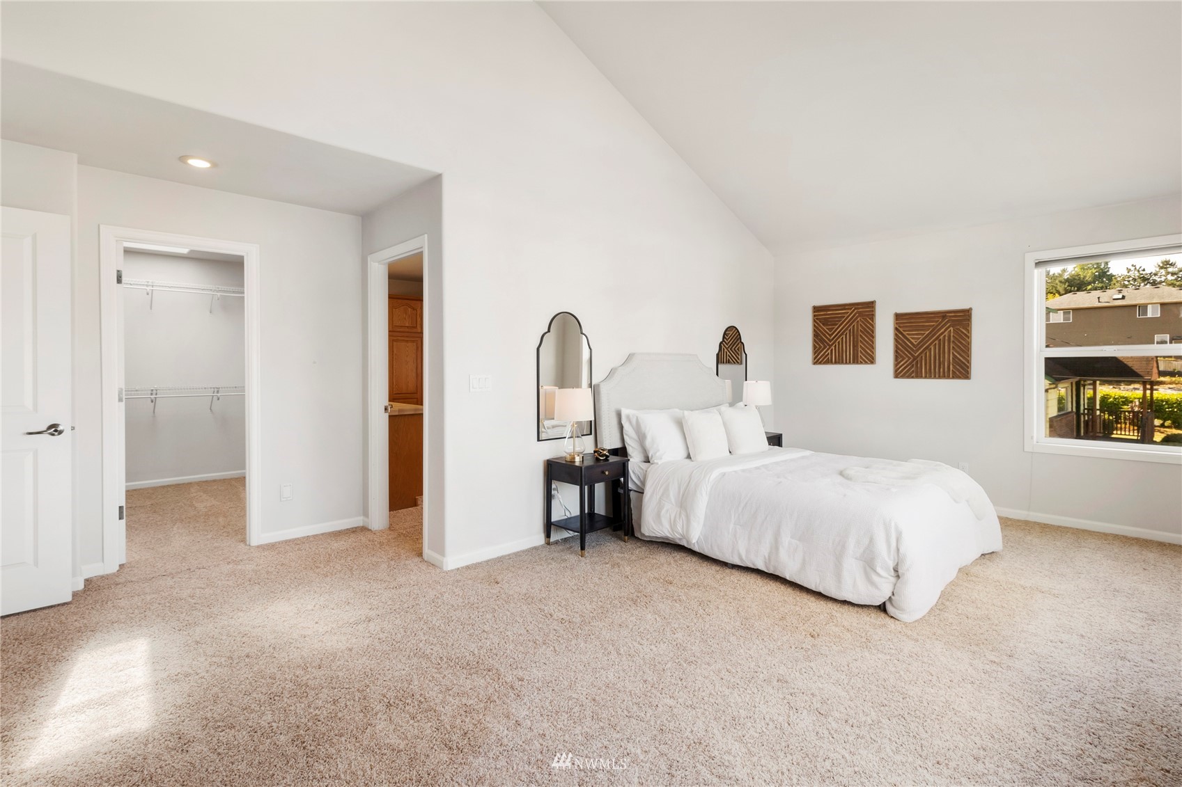 3904 Park Avenue North Renton, WA 98056 - Photo 25 of 40 a bed room with a bed and a painting