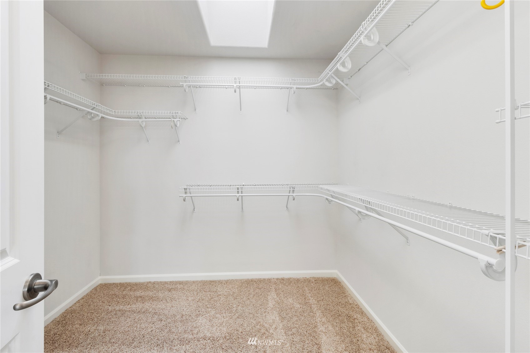 3904 Park Avenue North Renton, WA 98056 - Photo 32 of 40 a view of a room with racks on the wall