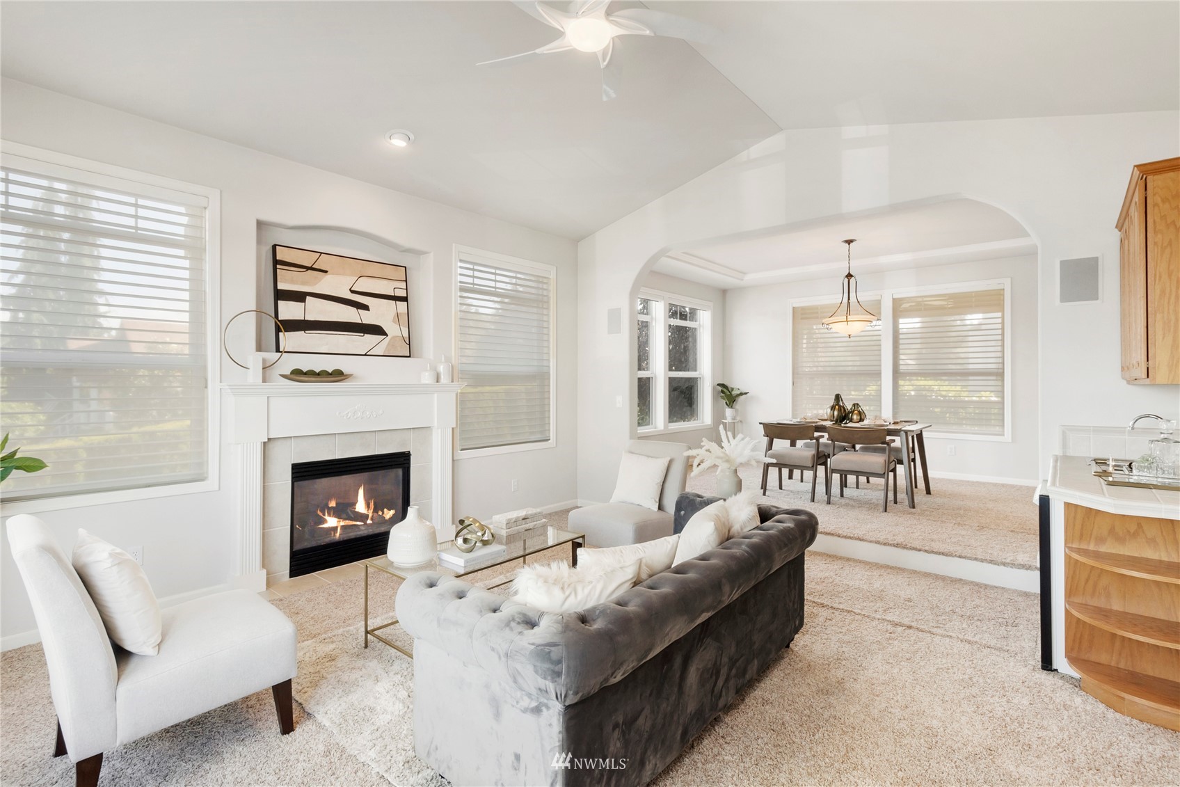 3904 Park Avenue North Renton, WA 98056 - Photo 6 of 40 a living room with furniture and a fireplace