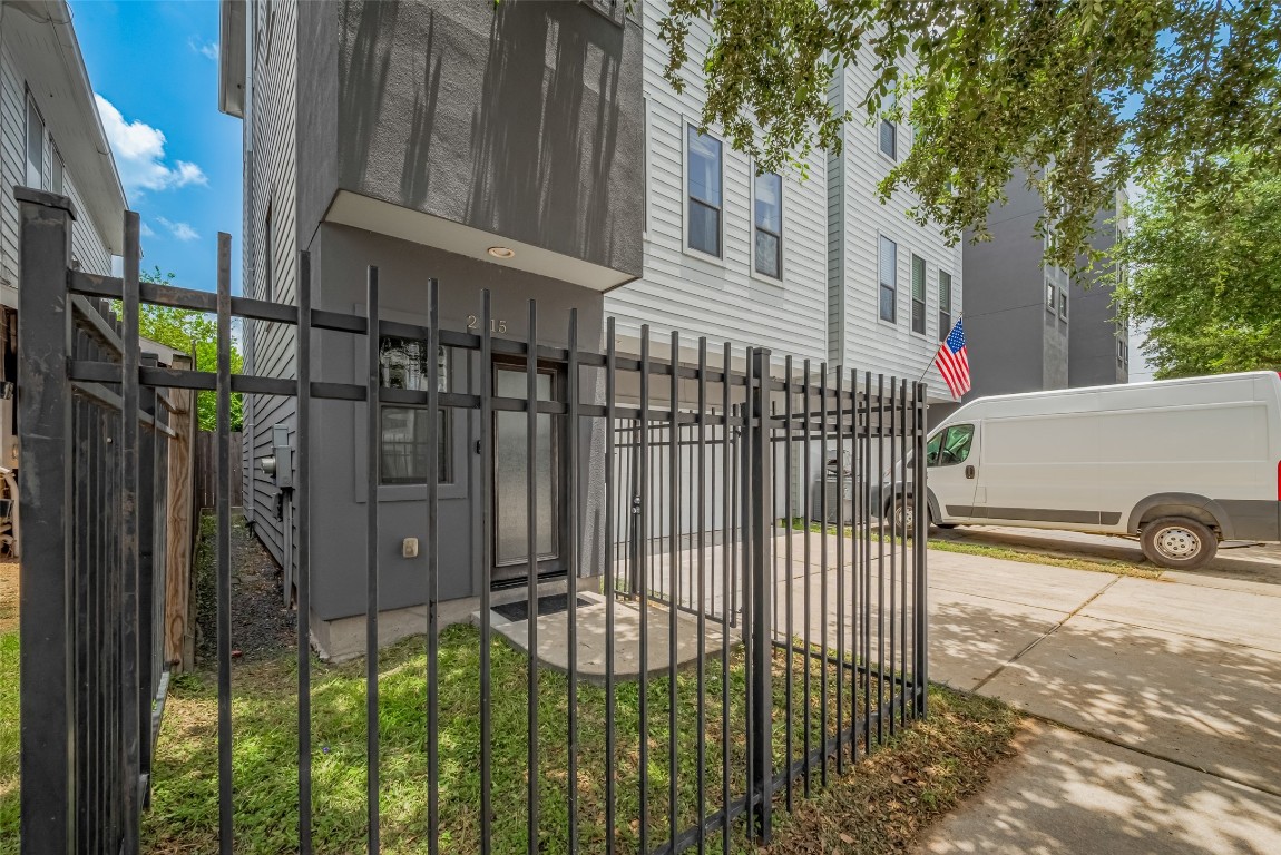 2115 Hadley Street Houston, TX 77003 - Photo 2 of 34 a view of a house with a small yard and potted plants