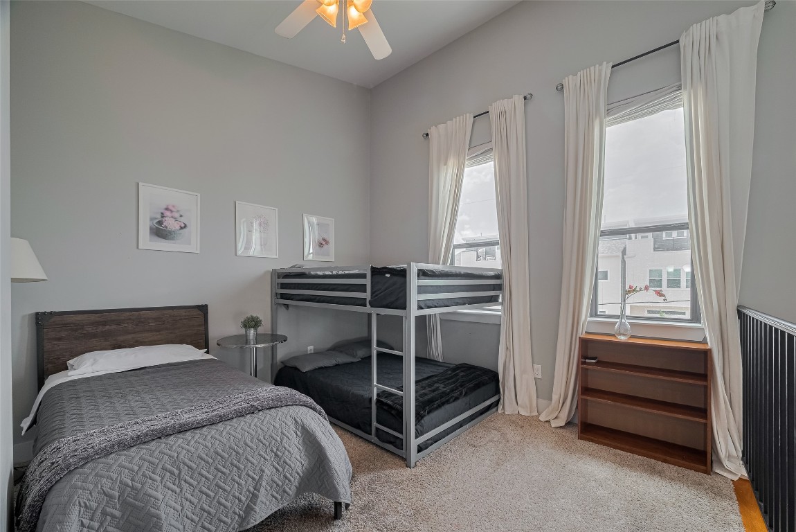 2115 Hadley Street Houston, TX 77003 - Photo 26 of 34 a bedroom with a bed and a window