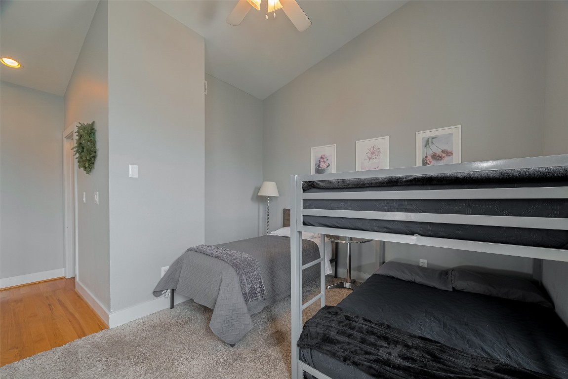 2115 Hadley Street Houston, TX 77003 - Photo 27 of 34 a bedroom with a bed and a dresser