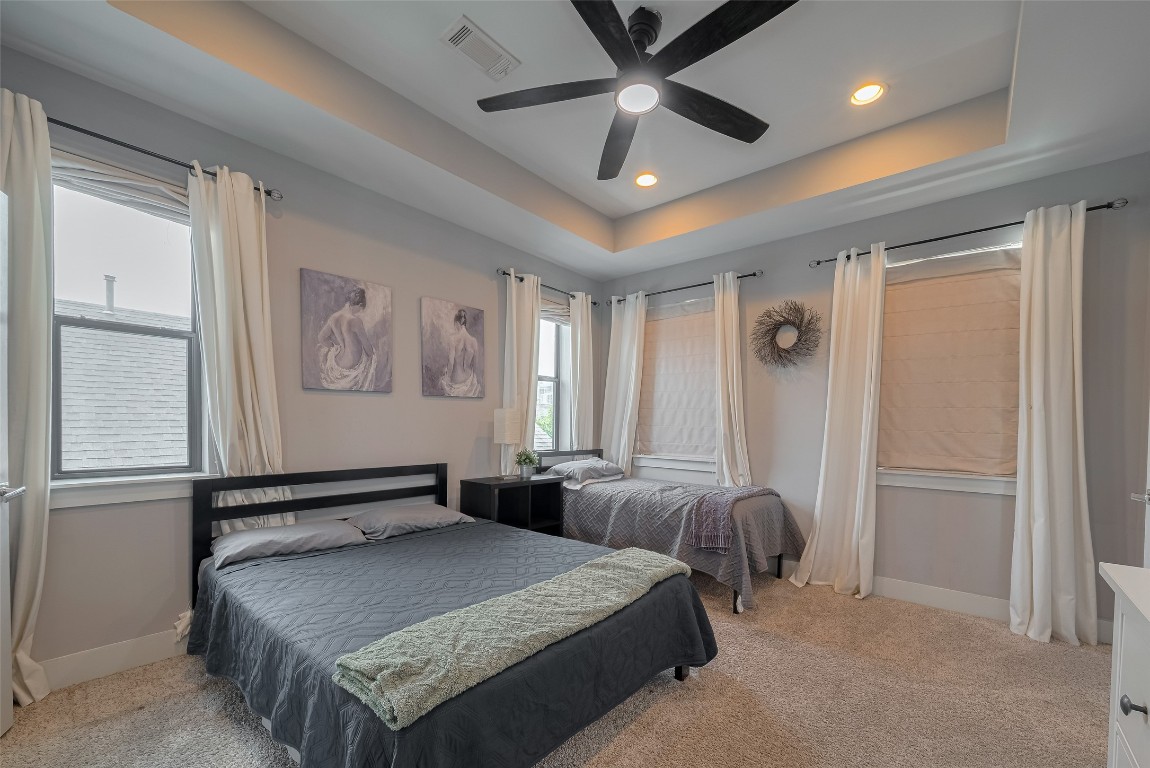 2115 Hadley Street Houston, TX 77003 - Photo 28 of 34 a bed room with large bed and a window