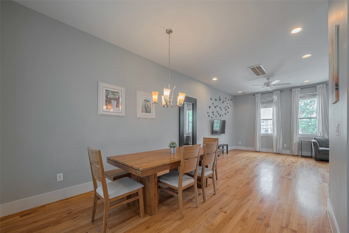 2115 Hadley Street Houston, TX 77003 - Photo 9 of 34 a view of a dining room with furniture and wooden floor
