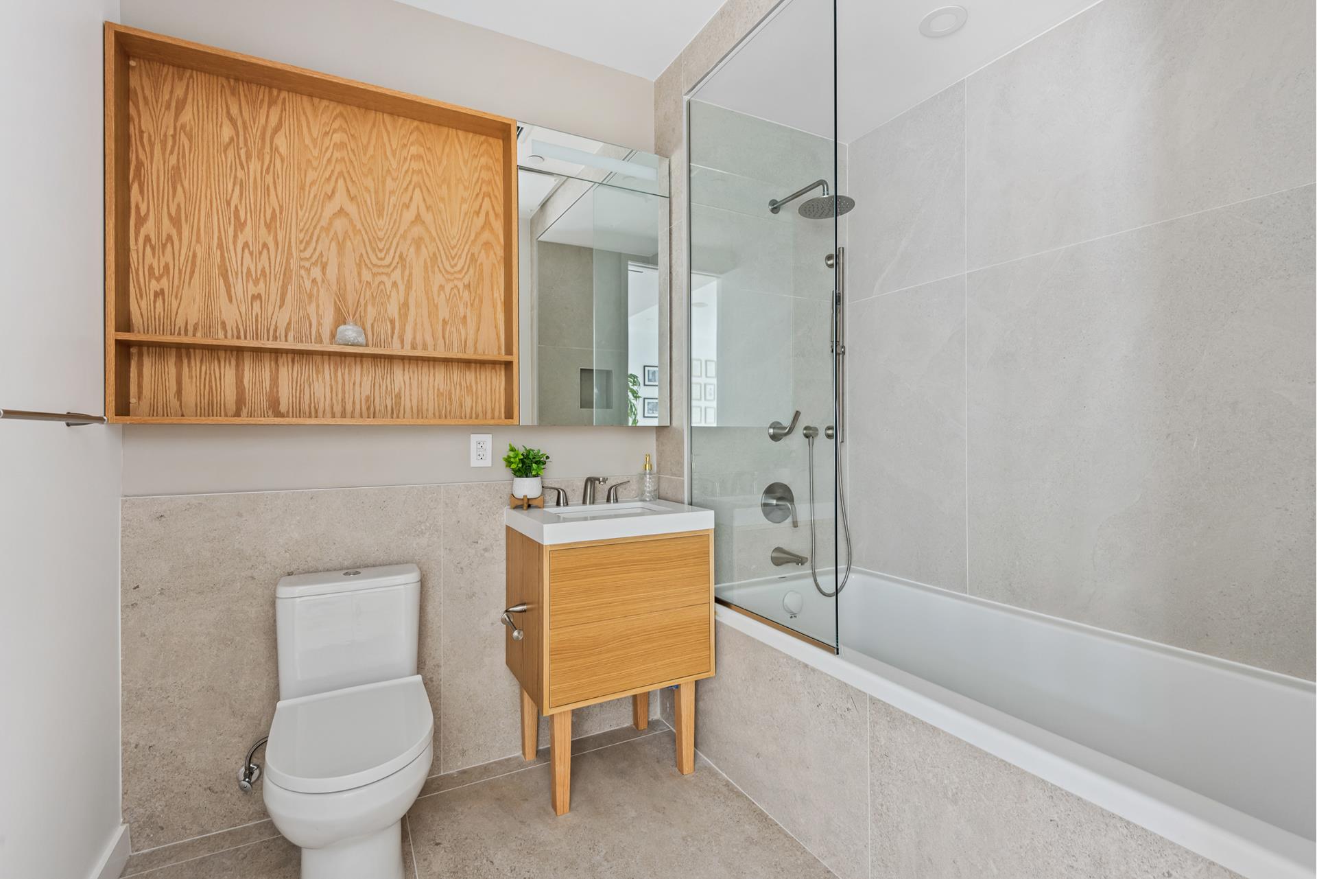 218 Classon Avenue, Unit GARDEN Brooklyn, NY 11205 - Photo 10 of 18 a bathroom with a toilet sink and shower