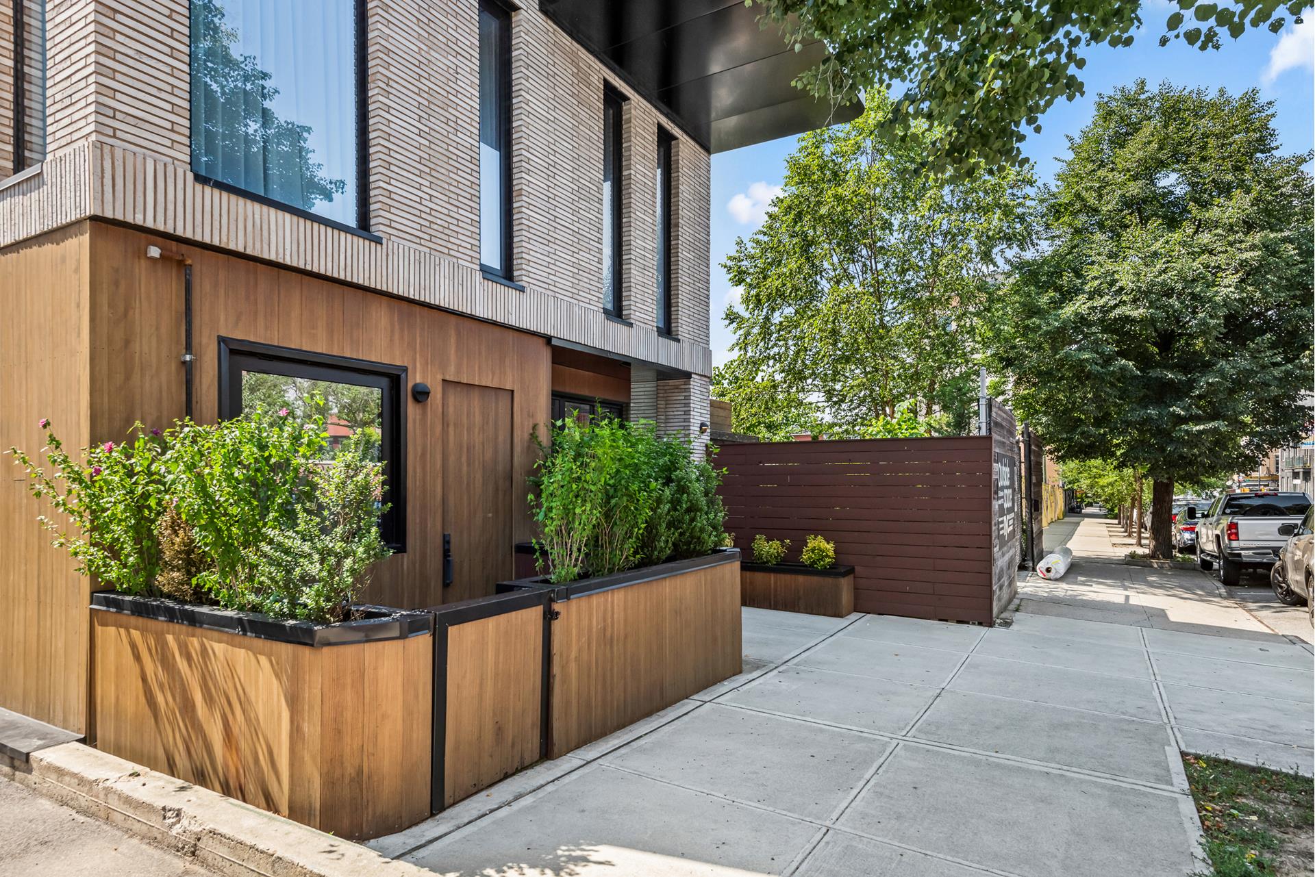 218 Classon Avenue, Unit GARDEN Brooklyn, NY 11205 - Photo 17 of 18 front view of a house with a yard