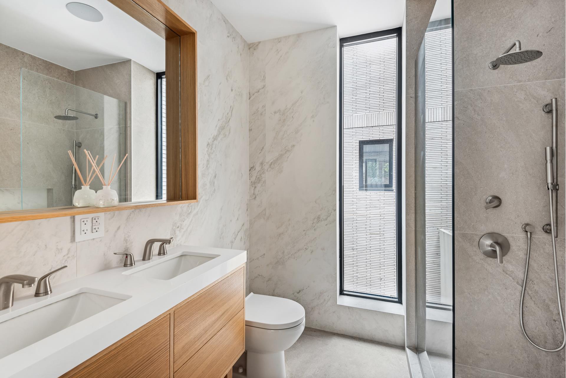 218 Classon Avenue, Unit GARDEN Brooklyn, NY 11205 - Photo 8 of 18 a bathroom with a granite countertop sink toilet and shower