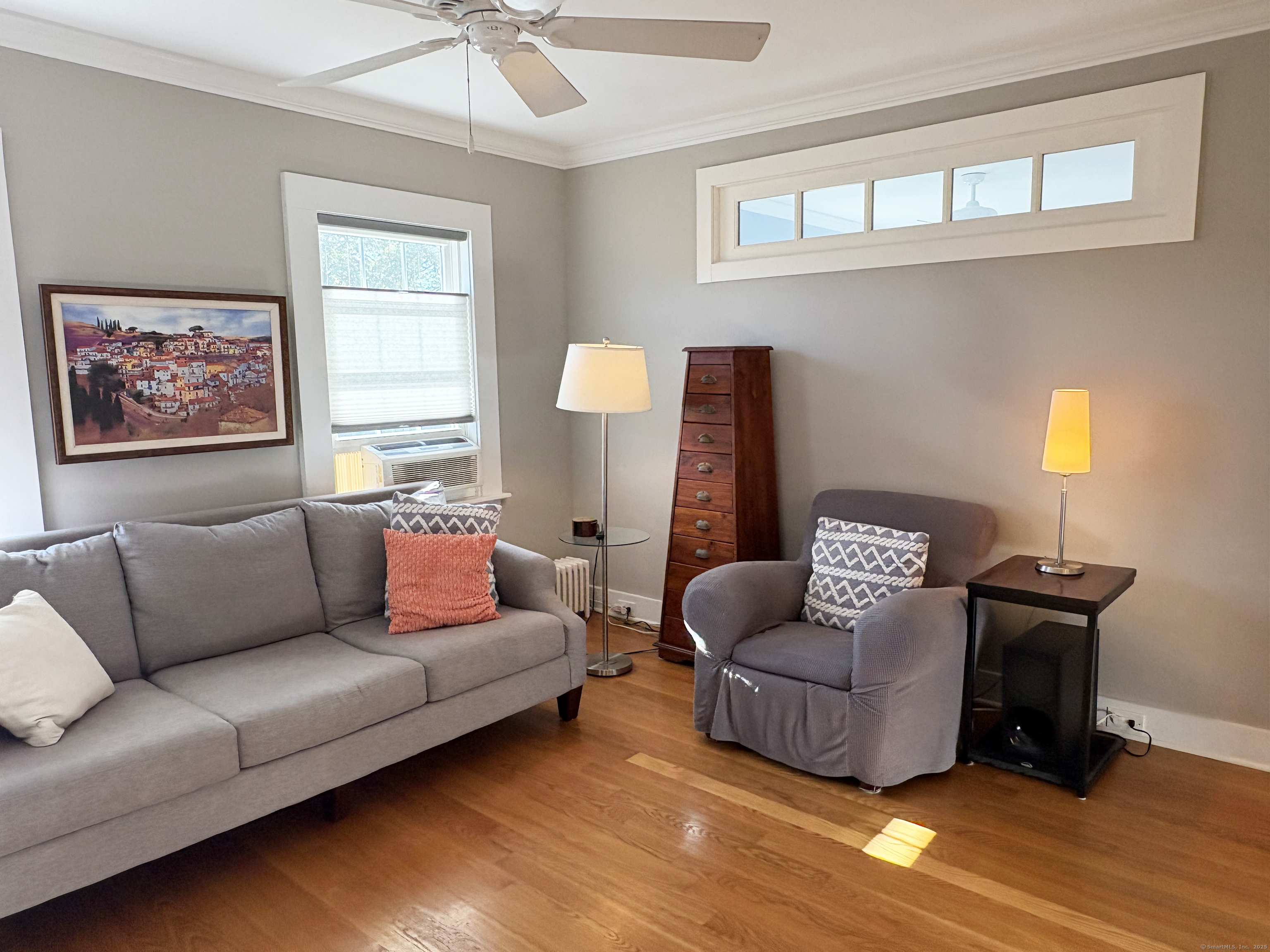 20 Haddon Street, Unit 5 Bridgeport, CT 06605 - Photo 11 of 40 a living room with furniture and a window