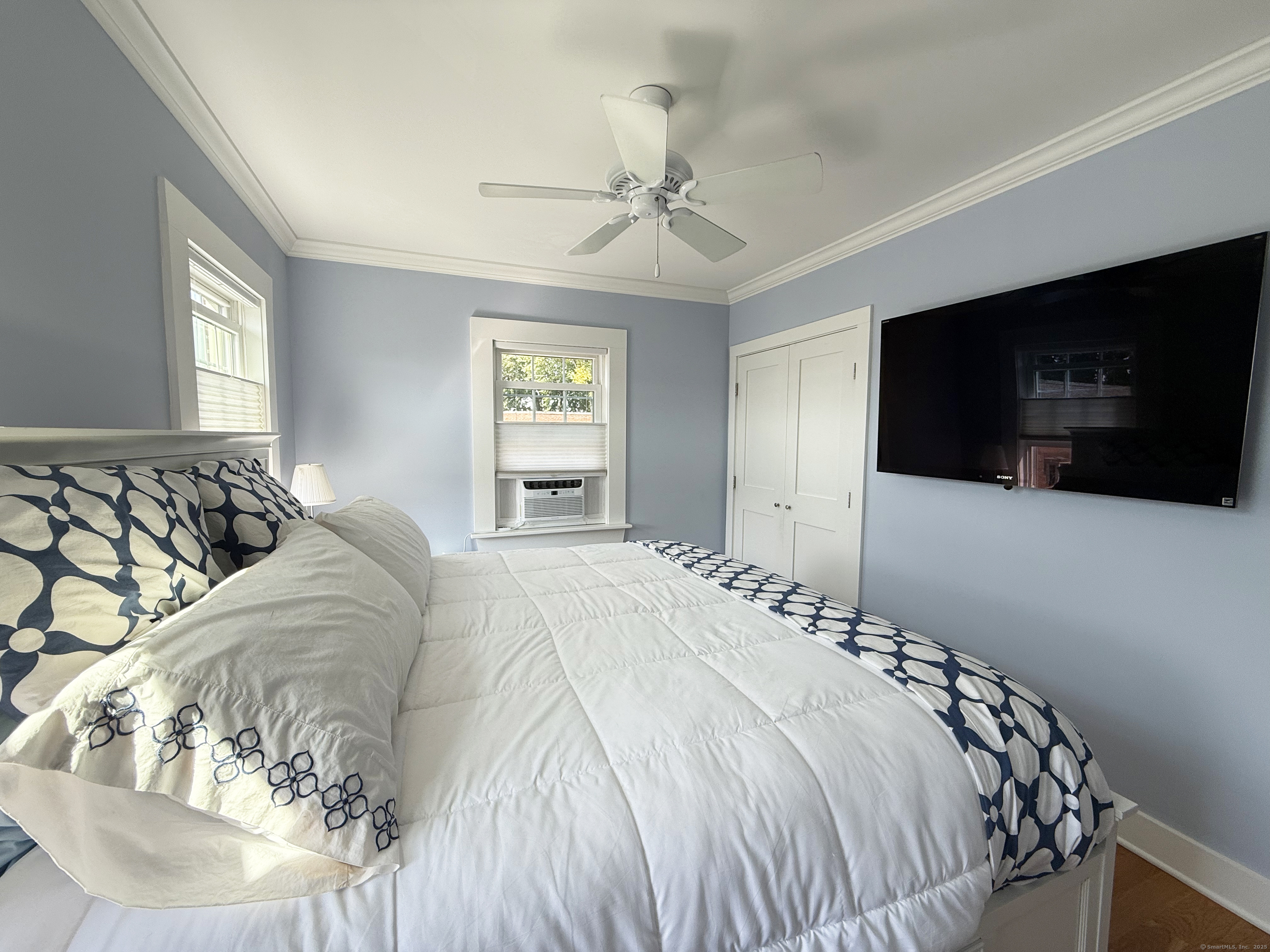 20 Haddon Street, Unit 5 Bridgeport, CT 06605 - Photo 13 of 40 a bedroom with a bed and a television