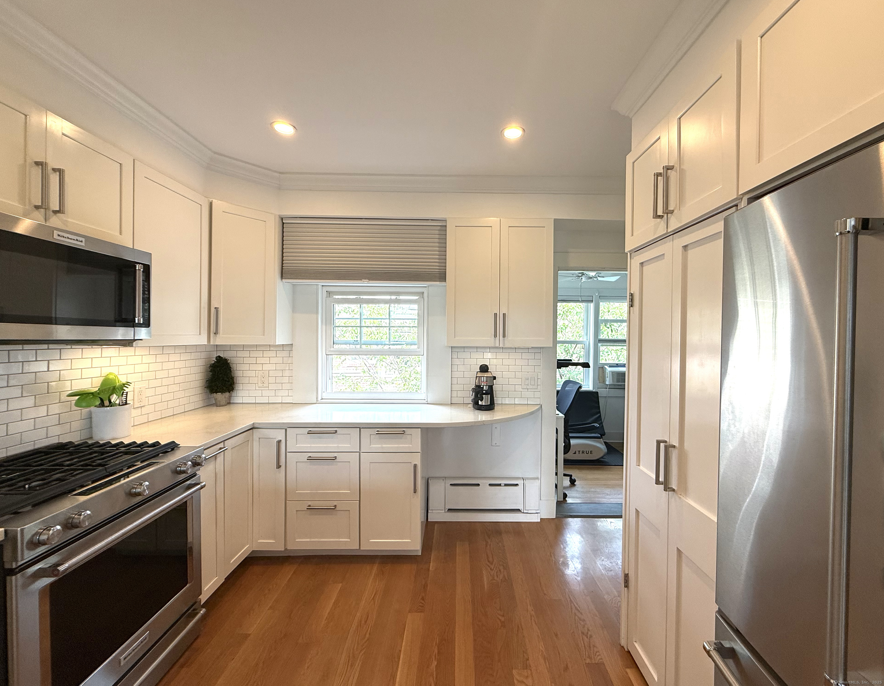 20 Haddon Street, Unit 5 Bridgeport, CT 06605 - Photo 17 of 40 a kitchen with stainless steel appliances a stove a sink and a refrigerator