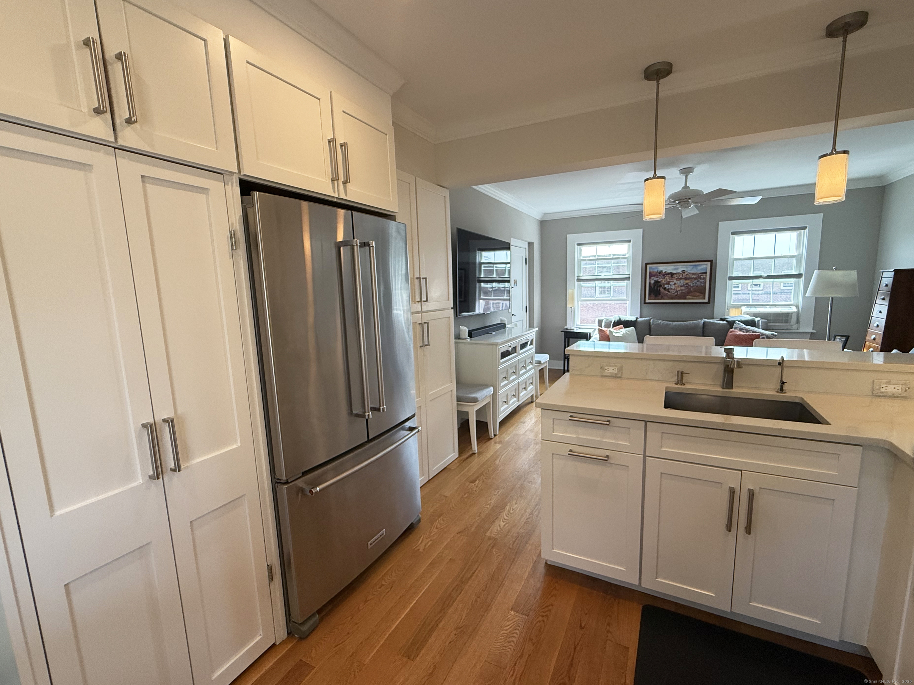 20 Haddon Street, Unit 5 Bridgeport, CT 06605 - Photo 20 of 40 a kitchen with a refrigerator sink and cabinets