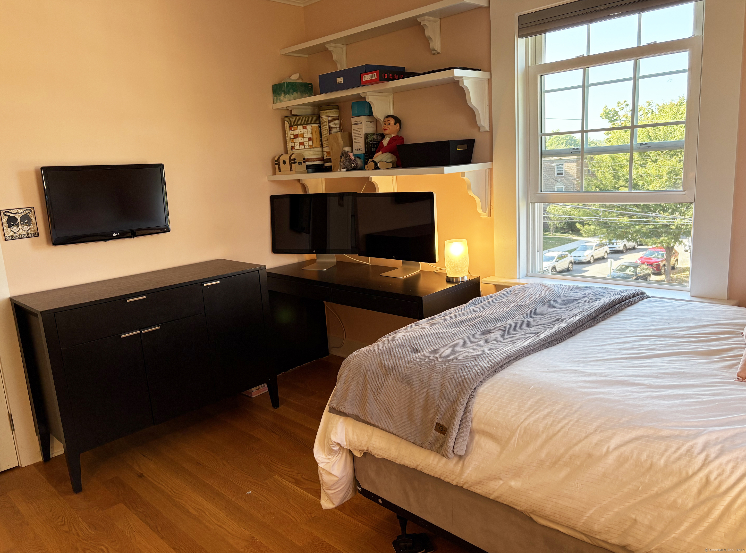 20 Haddon Street, Unit 5 Bridgeport, CT 06605 - Photo 24 of 40 a bedroom with a bed and a flat screen tv