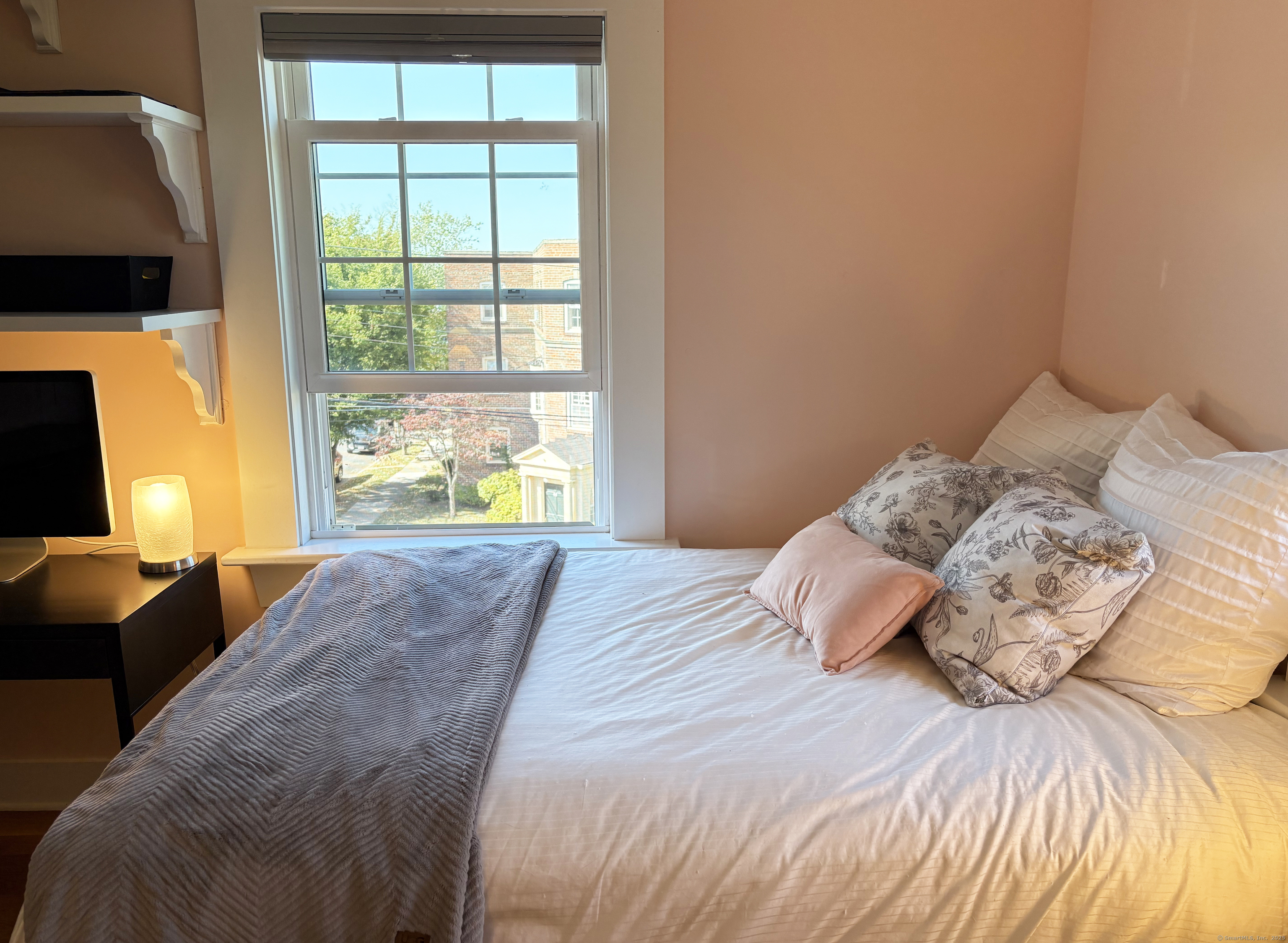 20 Haddon Street, Unit 5 Bridgeport, CT 06605 - Photo 25 of 40 a bedroom with a bed and window