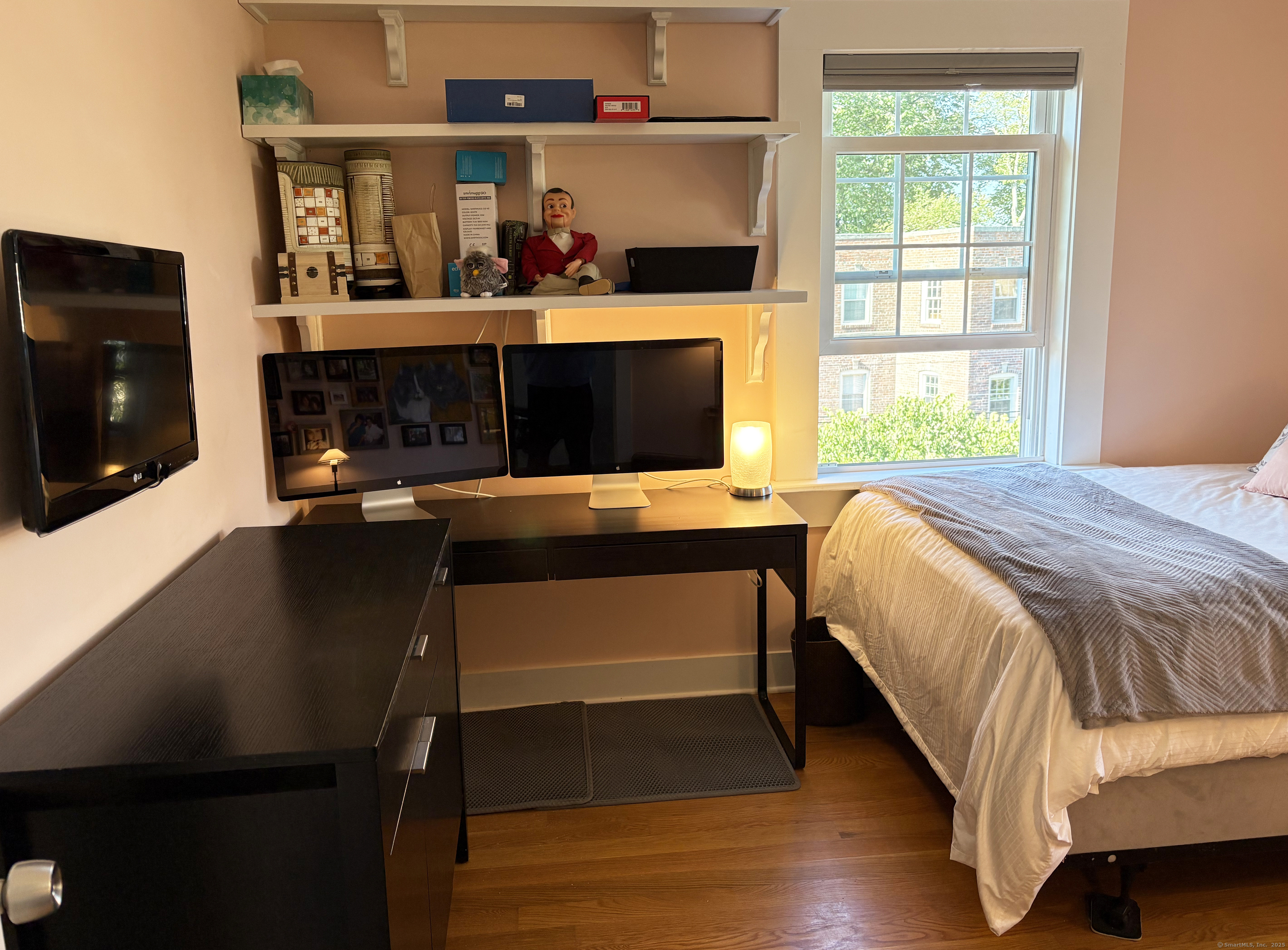 20 Haddon Street, Unit 5 Bridgeport, CT 06605 - Photo 26 of 40 a bedroom with a bed and window