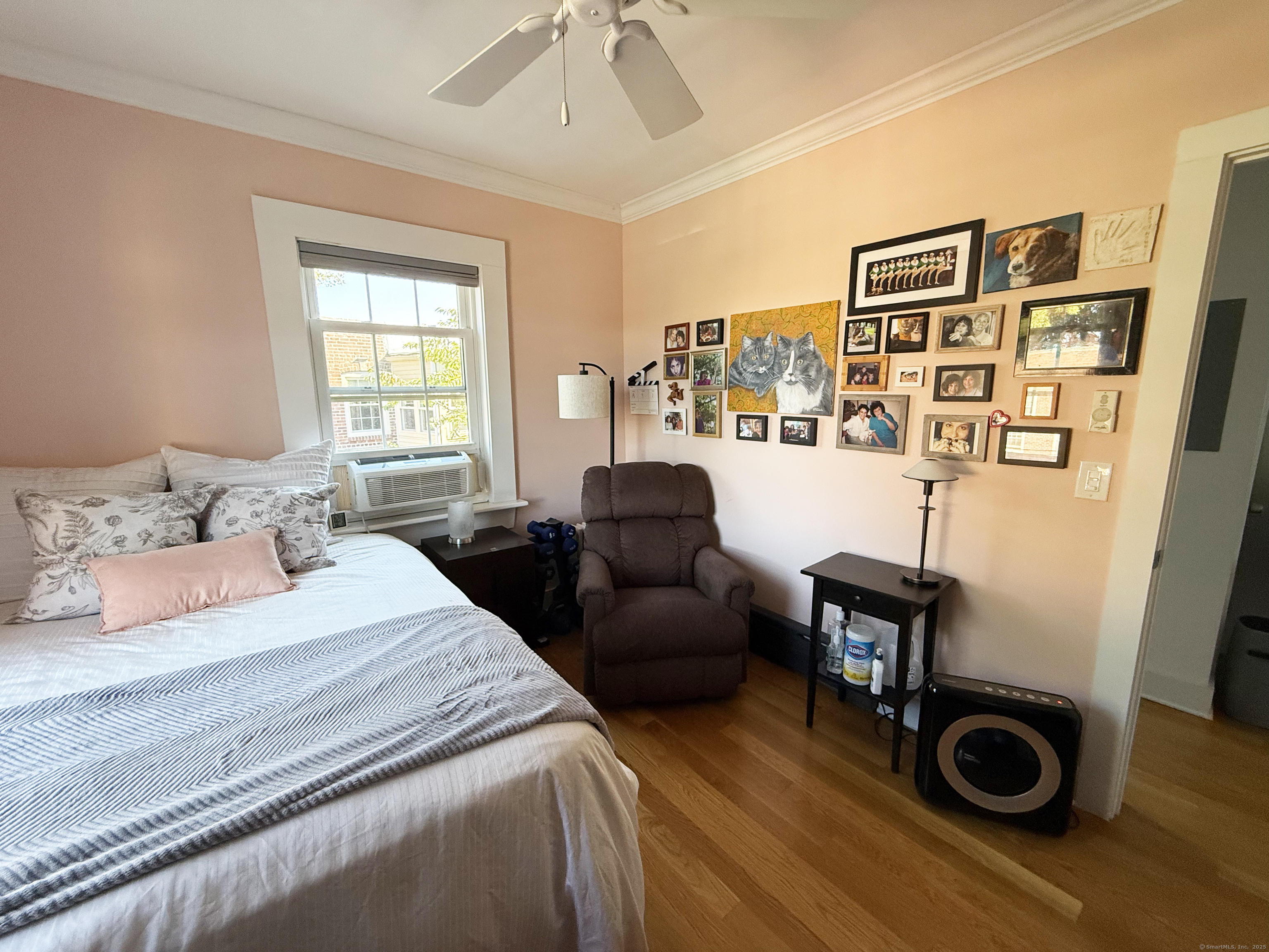 20 Haddon Street, Unit 5 Bridgeport, CT 06605 - Photo 27 of 40 a bedroom with furniture and wooden floor