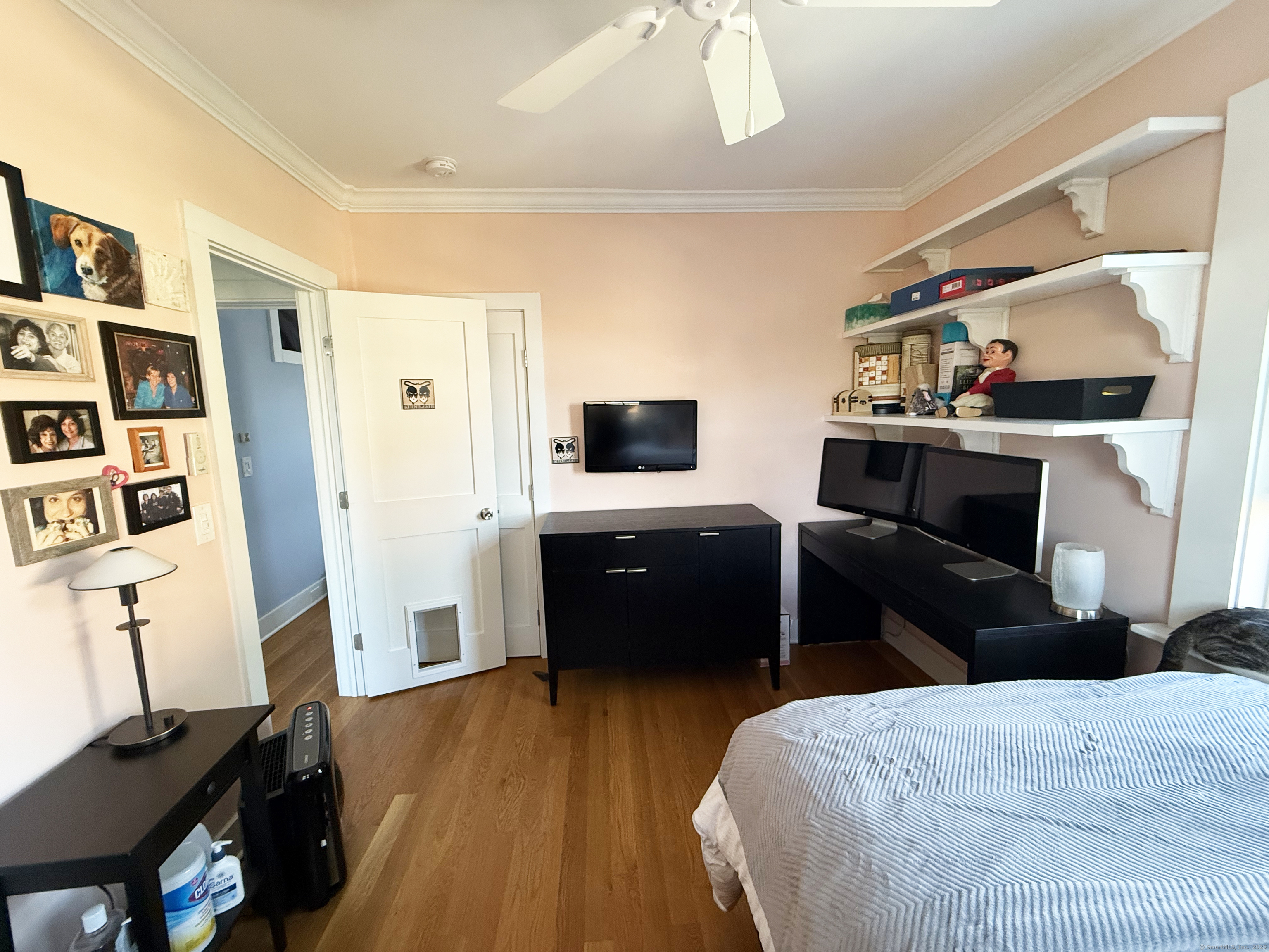 20 Haddon Street, Unit 5 Bridgeport, CT 06605 - Photo 28 of 40 a bedroom with furniture and a flat screen tv