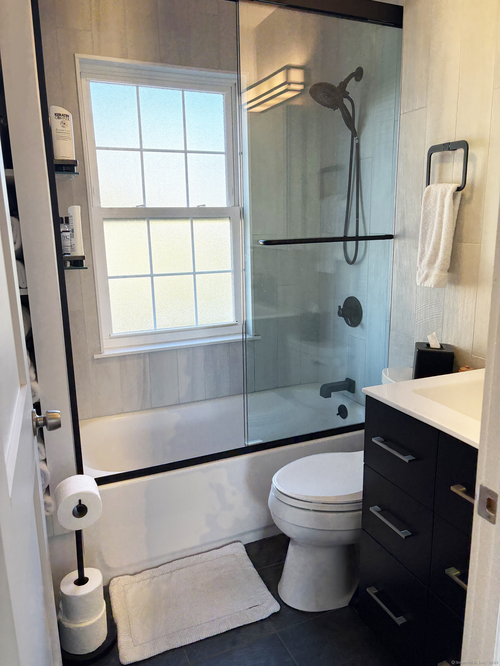 20 Haddon Street, Unit 5 Bridgeport, CT 06605 - Photo 33 of 40 a bathroom with a toilet and a shower